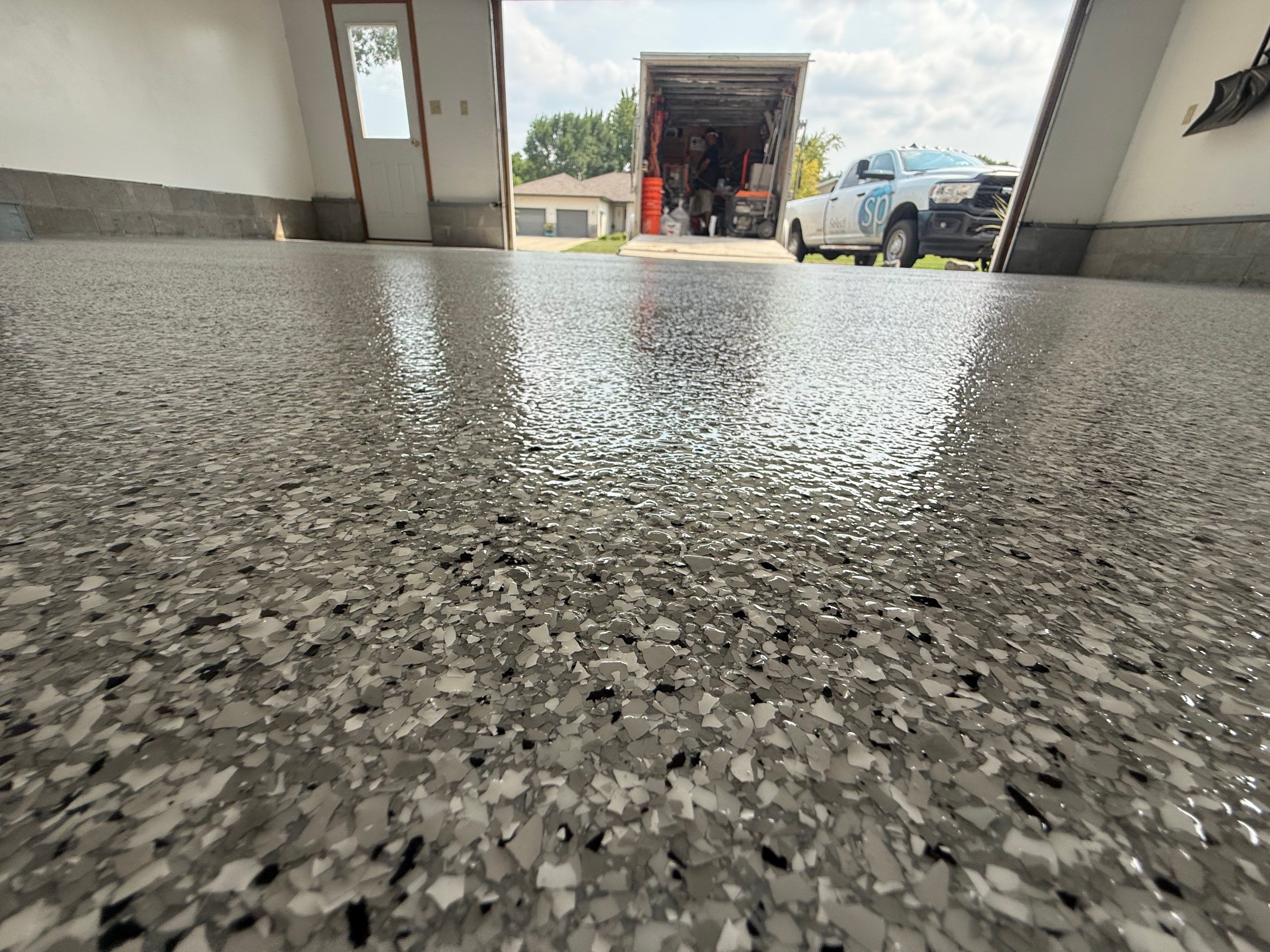 Feather Grey Garage Floor Coating and Concrete Restoration in Mitchell