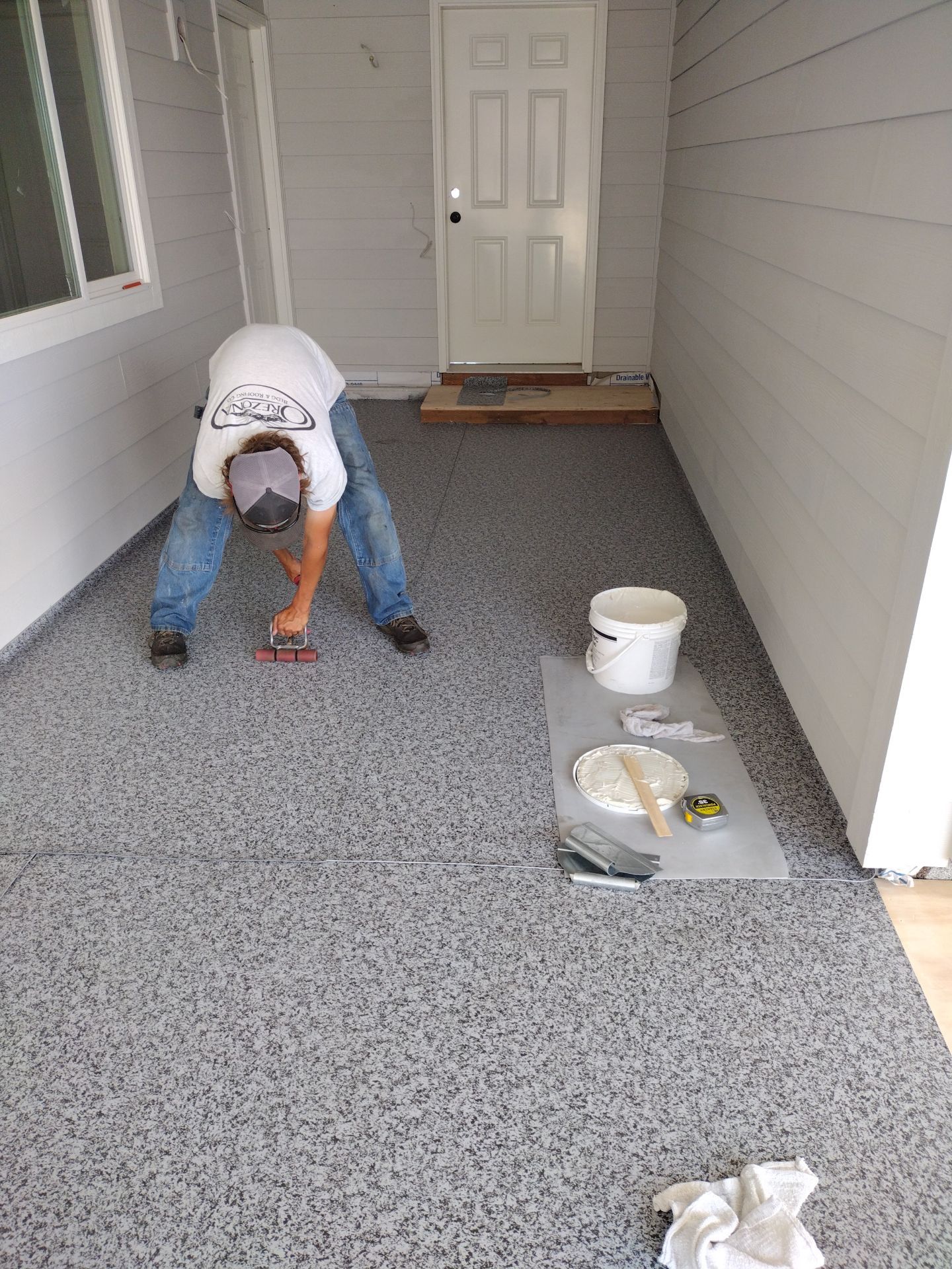 Dec-Tec Walkable Membrane using Dec-Tec (Color: Granite) by Orezona Building & Roofing Company, Inc.