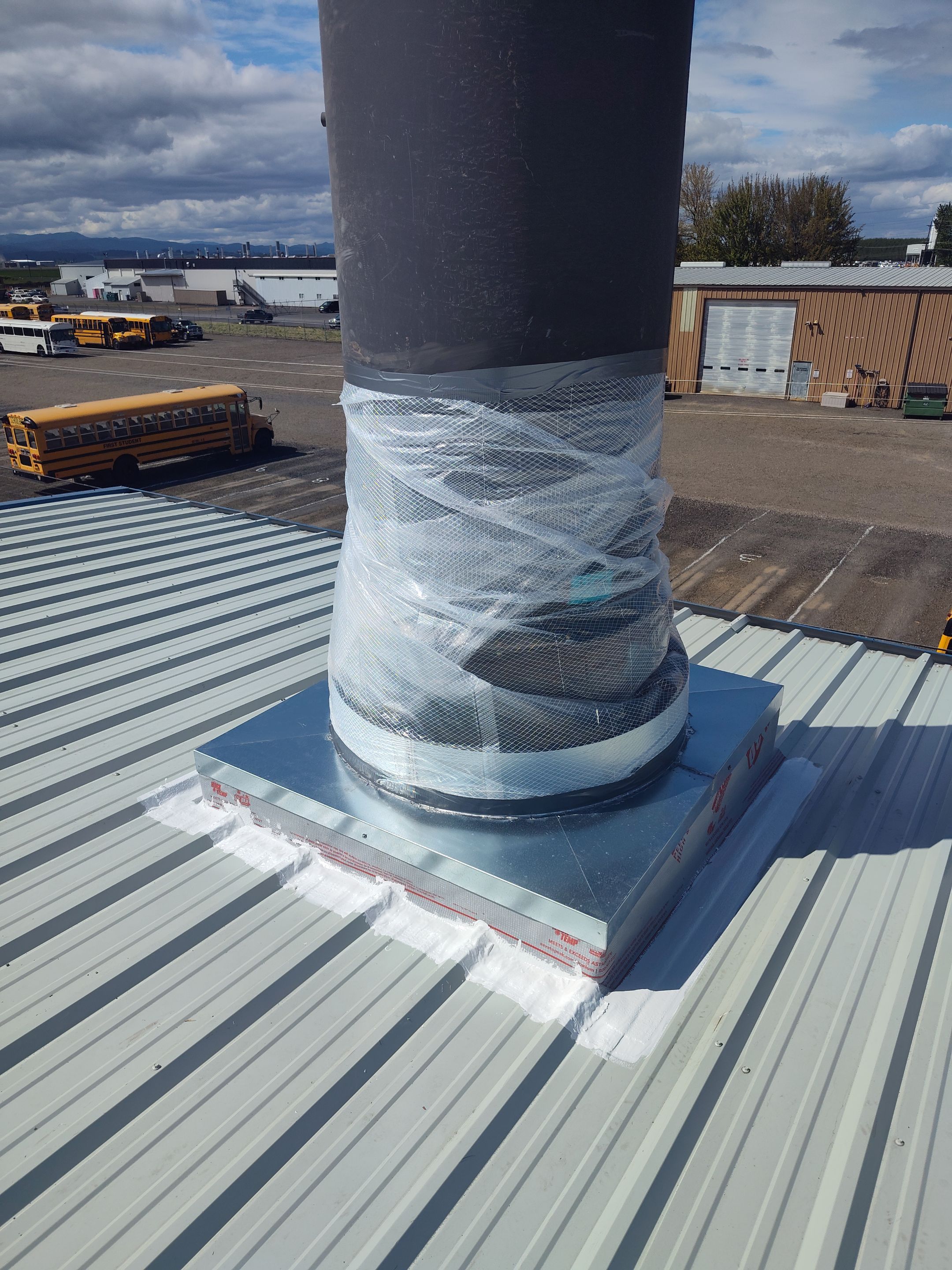 Installing New Curbs on a Metal Roof for new equipment by BEST Roofing & Waterproofing