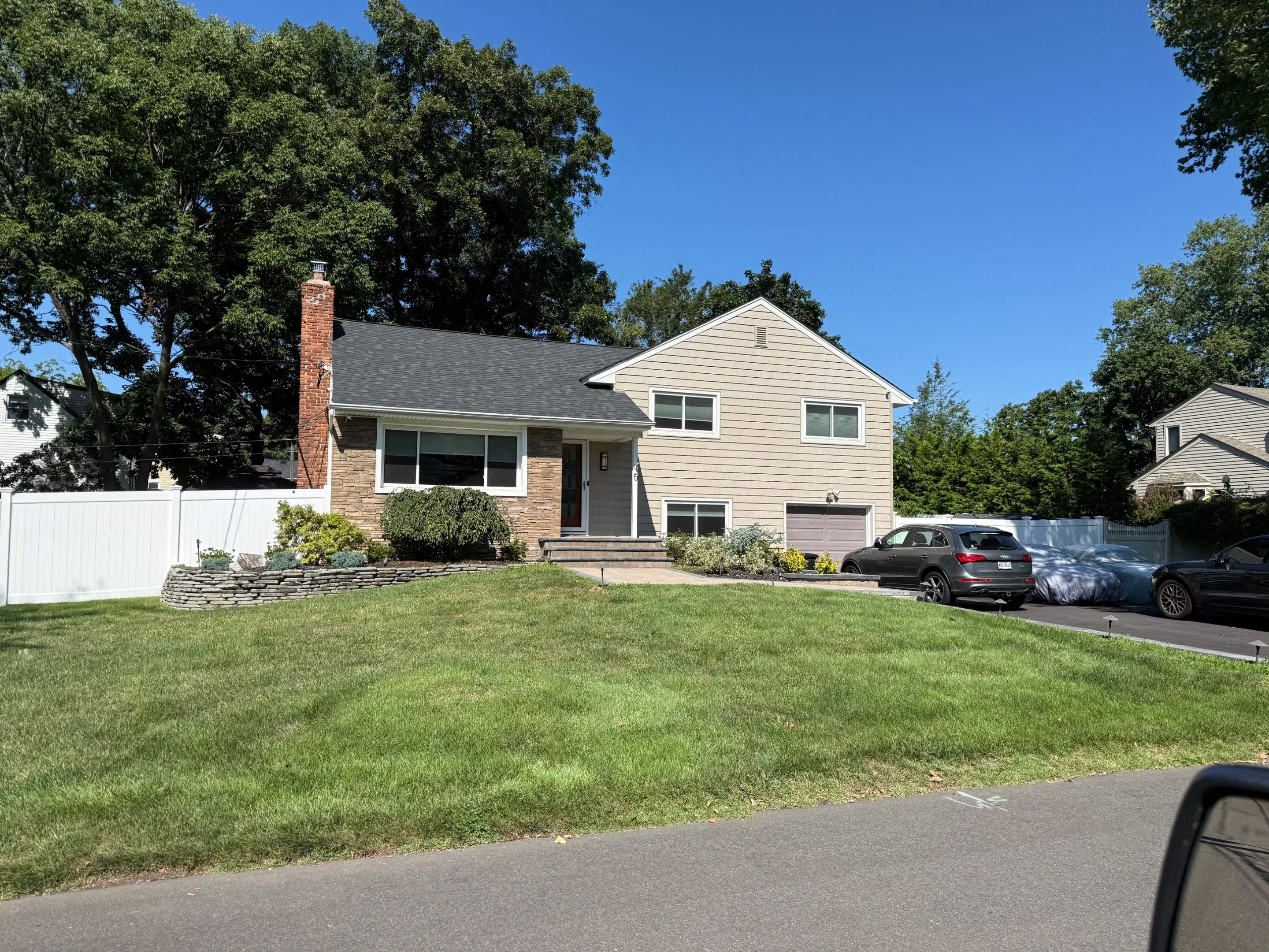 Residential Roof and Horizontal Siding Replacement in Melville by Smart Choice Contracting