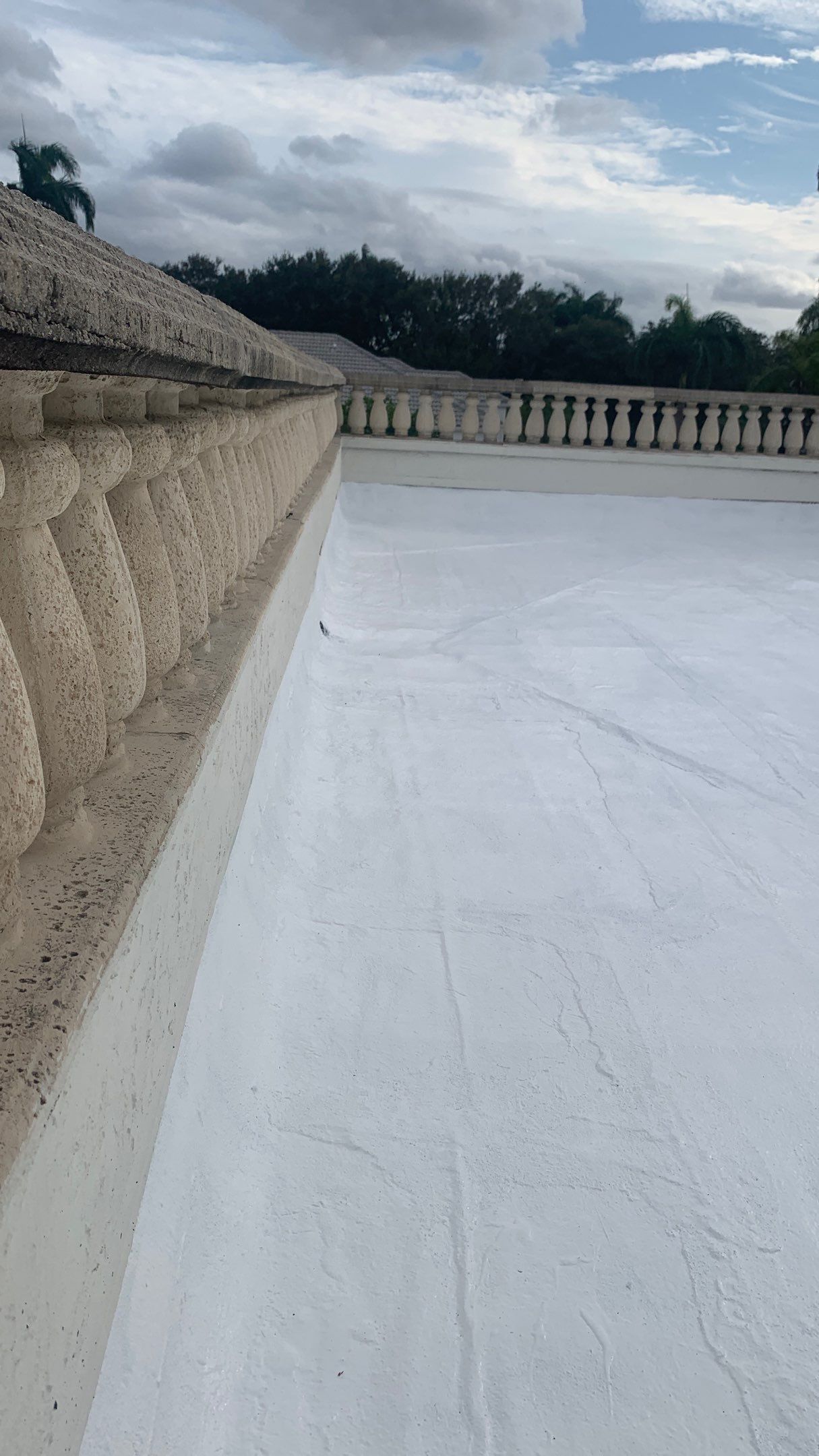 Residential Roofing Installation using Polybrite 90.1 silicone coating by BLUES BROTHERS CONSTRUCTION CORP