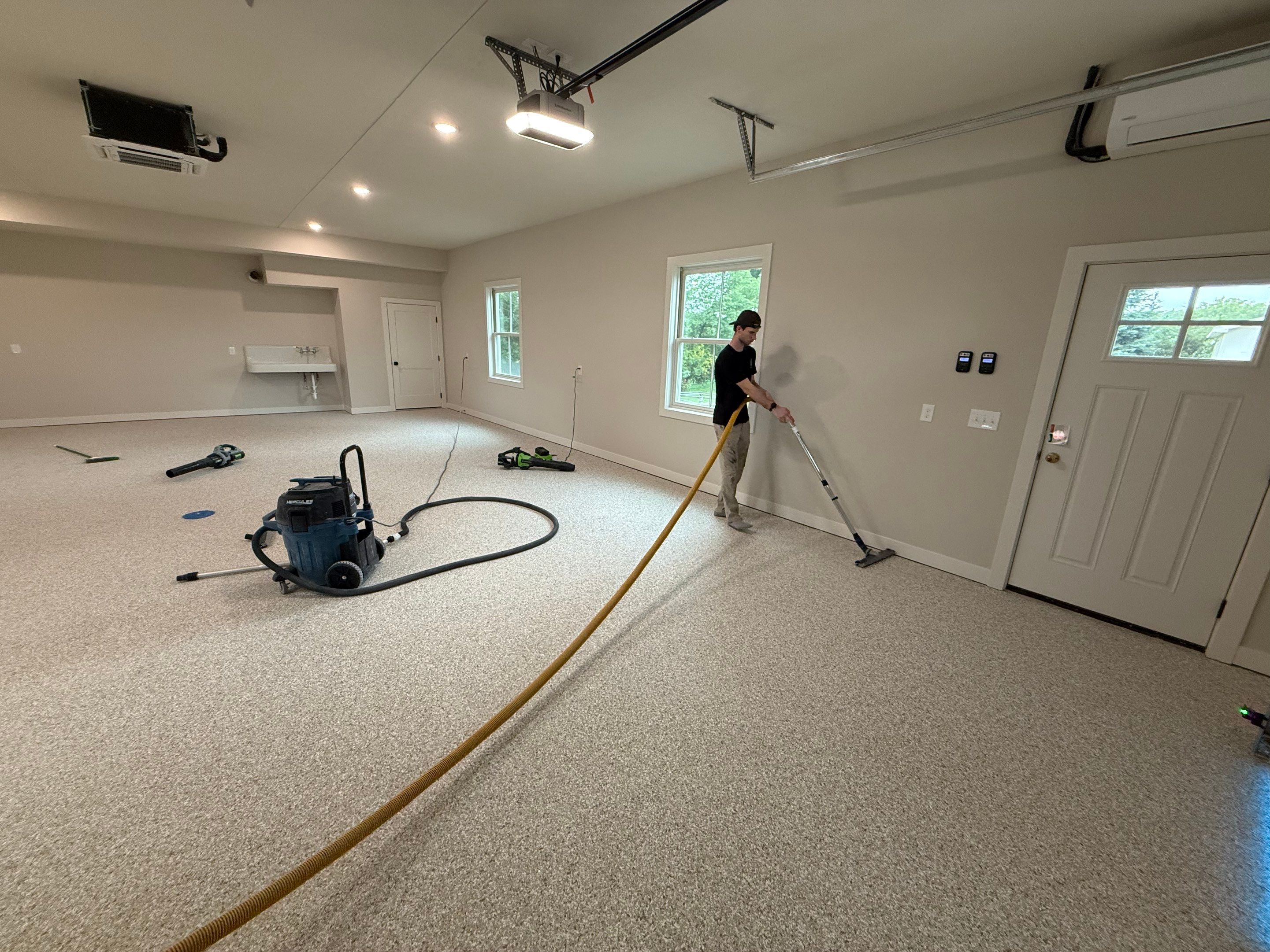 Trail Mix Epoxy Garage / Even Space by Goat Coatings