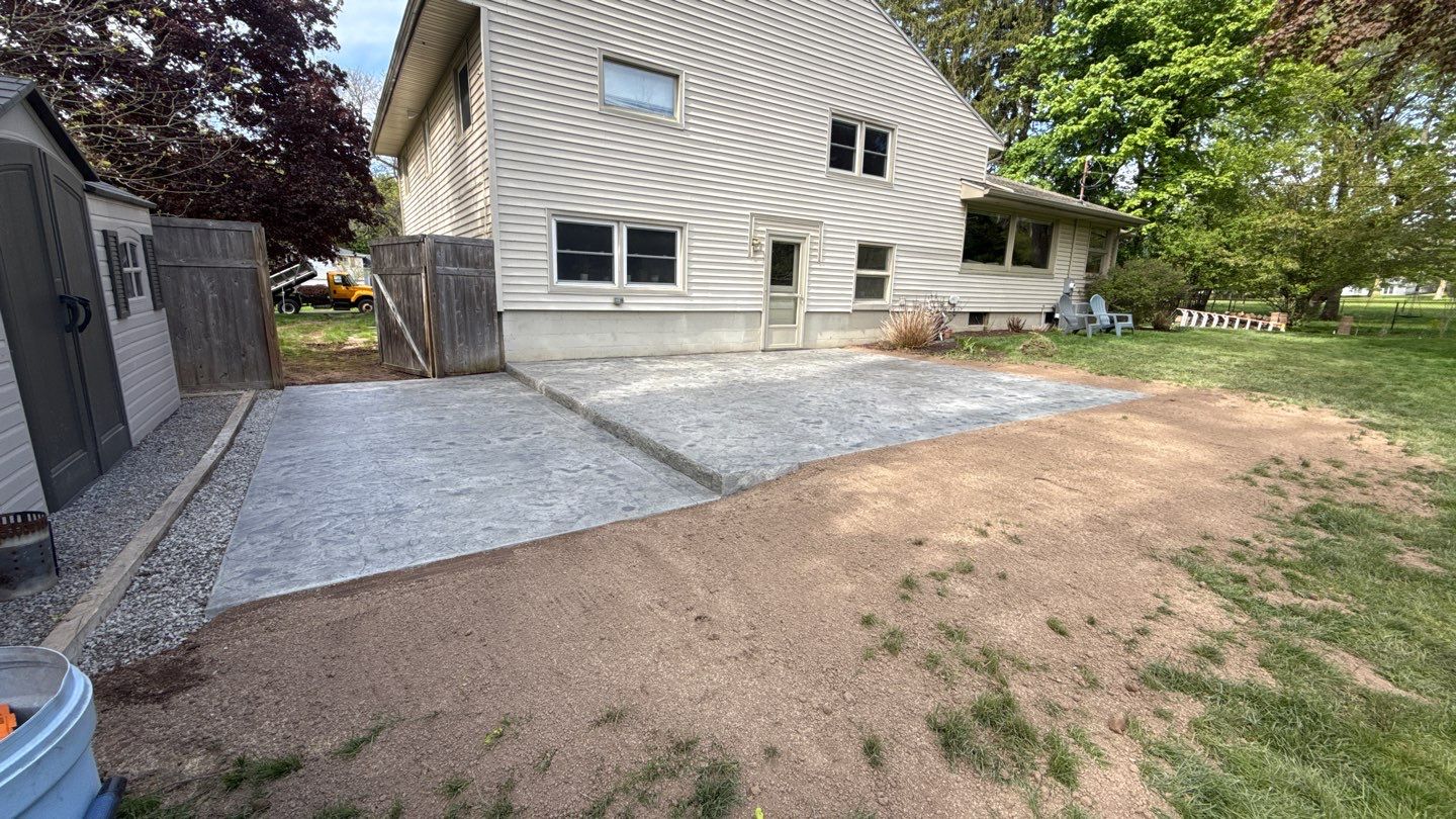 Oxford Slate Two Tiered Patio by NG Masonry & Construction LLC