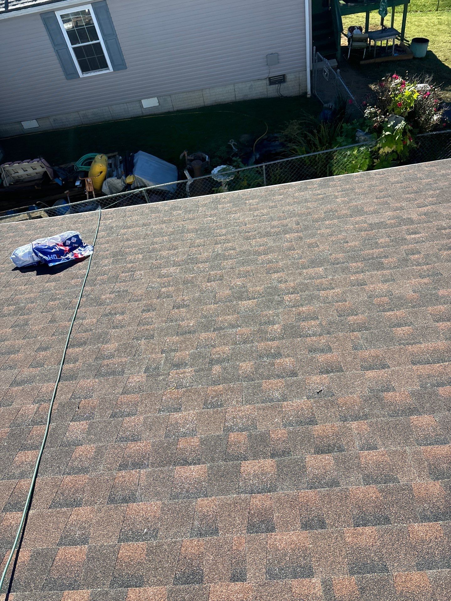 Residential Roofing Installation using GAF TImberline HDZ Hickory by Rainstoppers Roofing