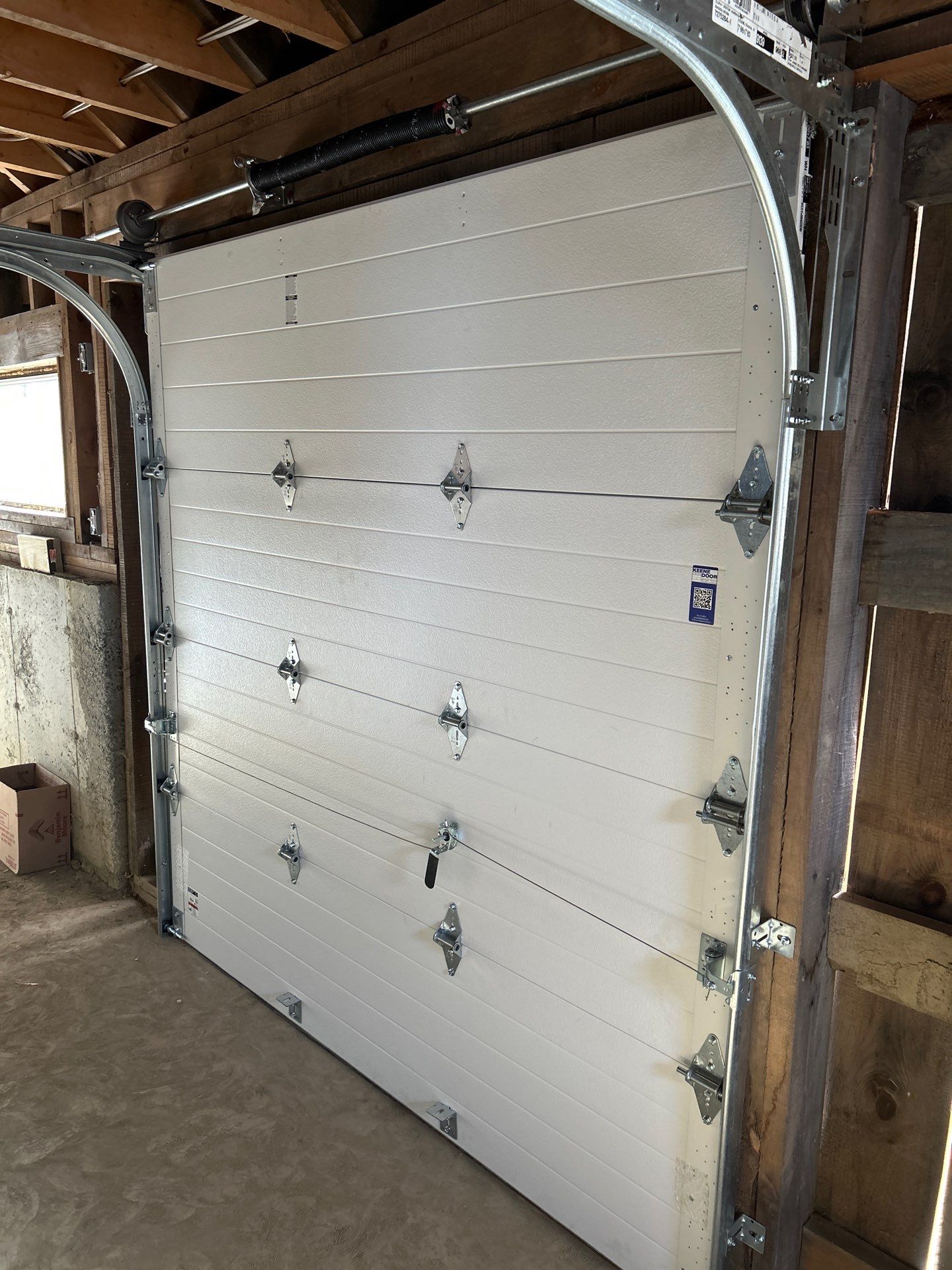 Door Installation using Clopay Modern Steel Garage Doors by Keene Door