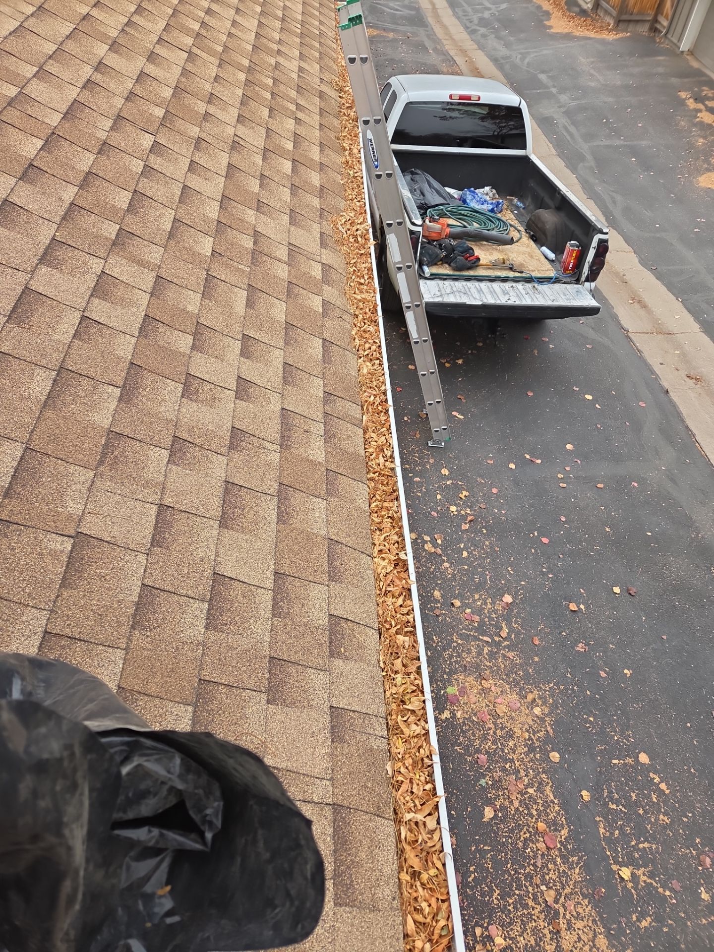 Gutter and Downspout Cleaning by RTP Roofing Company