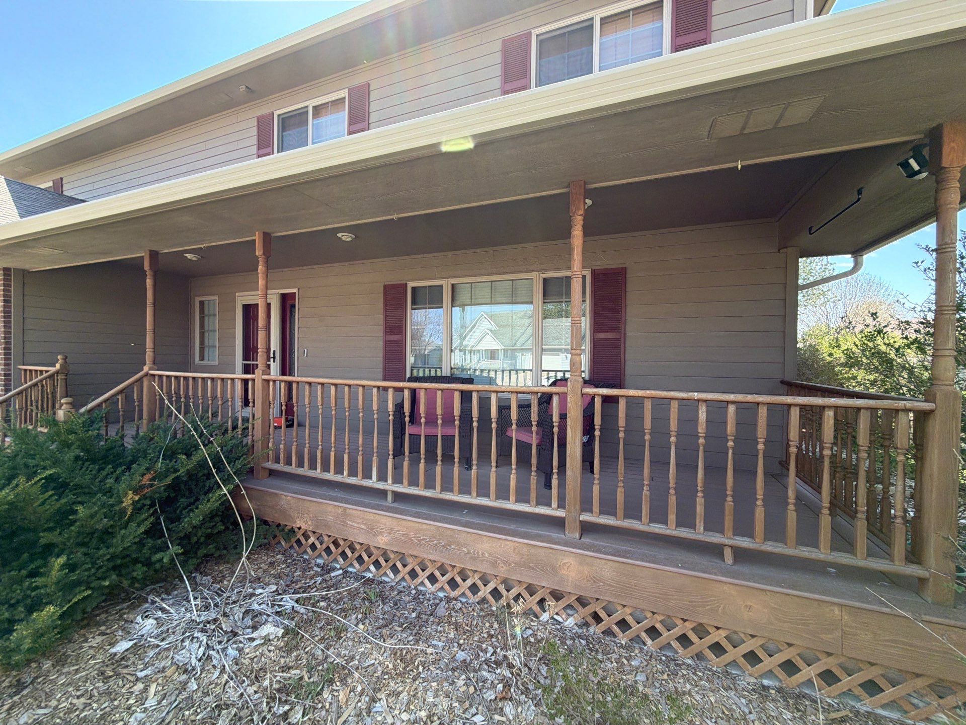 Residential Exterior Painting with Shutter and Trim Updates in Sioux Falls by Select Painting, Coatings & Garage Cabinets