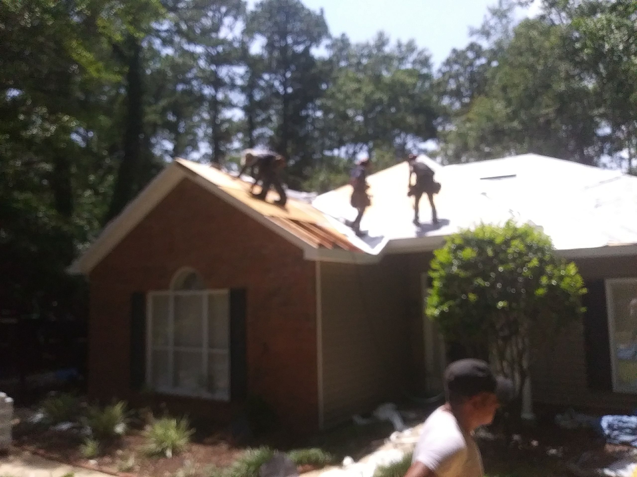 Residential Roofing Installation using Roof Replacement by American Roofing & Construction LLC