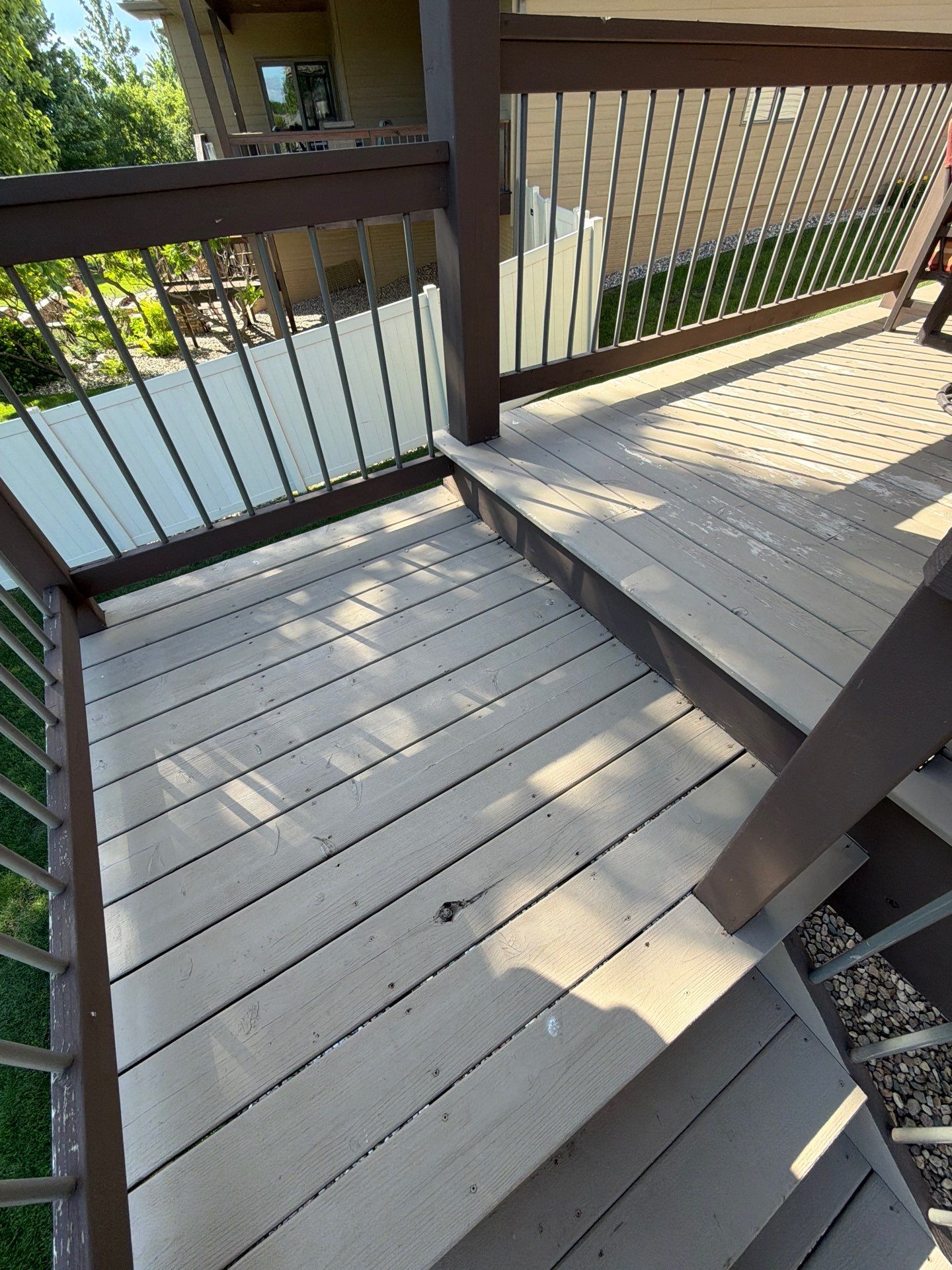 Sioux Falls Exterior Refresh and Multi-Level Deck Maintenance by Select Painting, Coatings & Garage Cabinets
