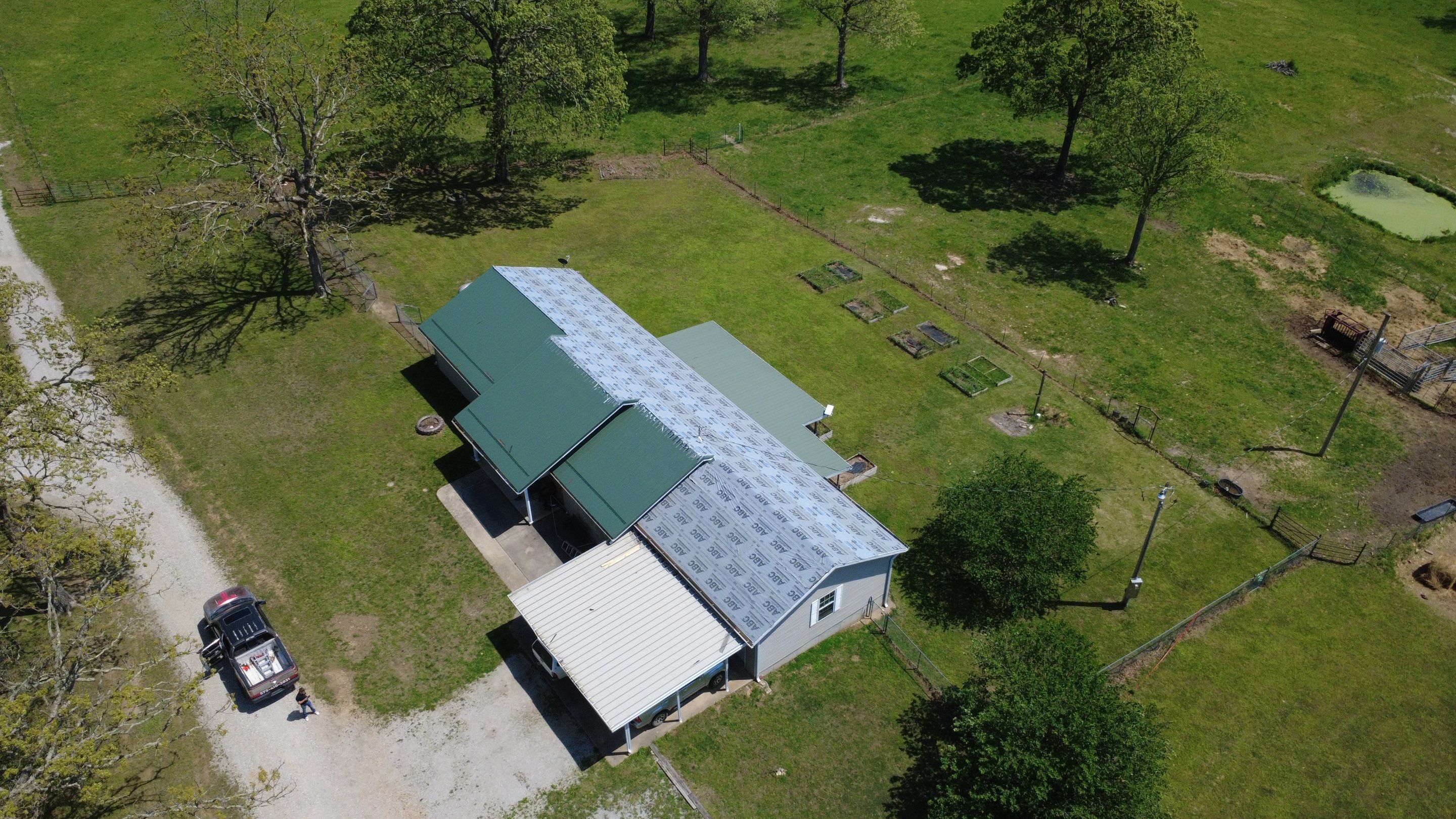 Residential Roof + Gutters & Downspouts & Gutter Covers Install  by Titan Commercial & Residential Roofing 