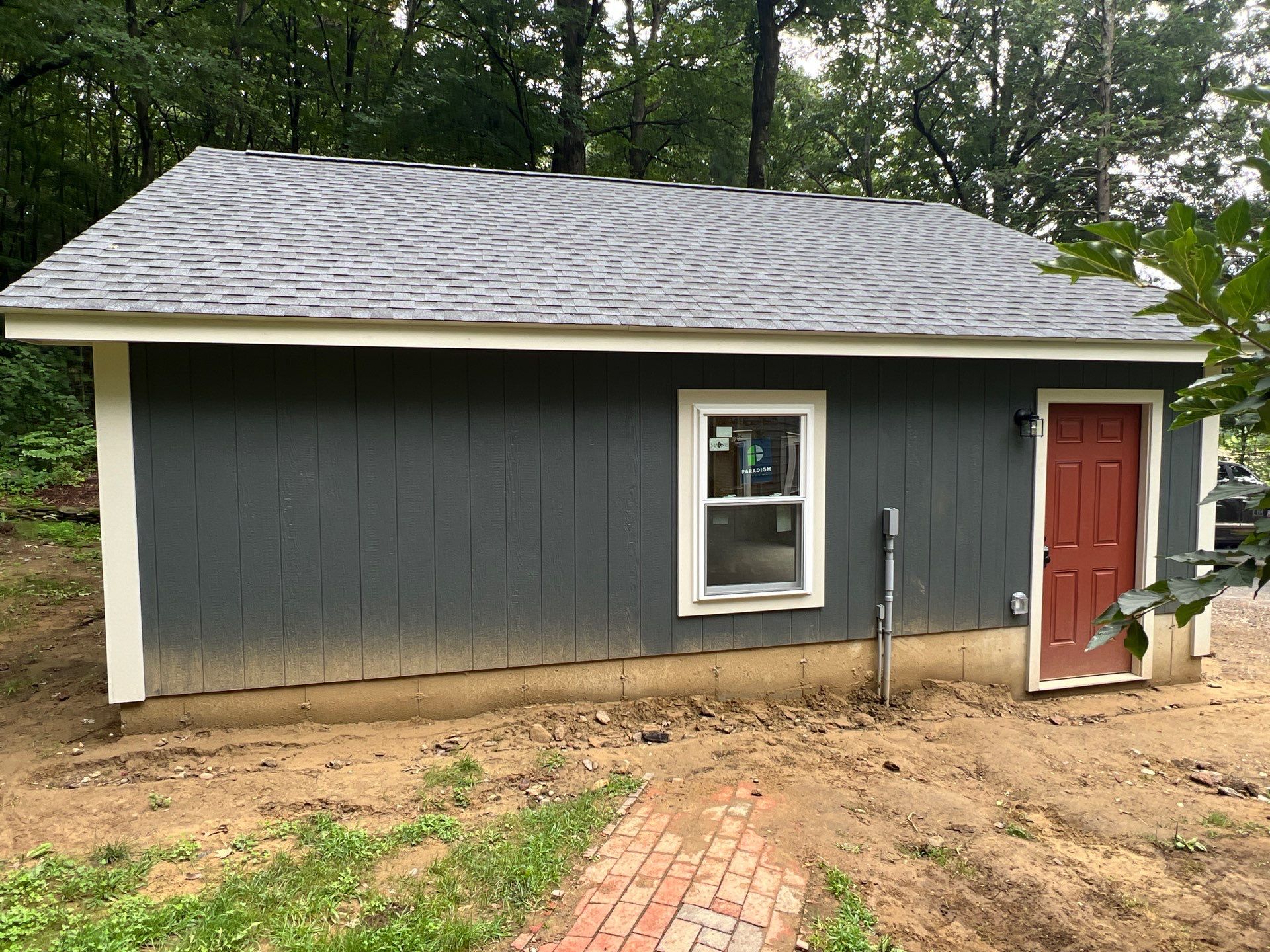 Garage using LP SmartSide Panel Siding by Chagnon Building & Remodeling LLC