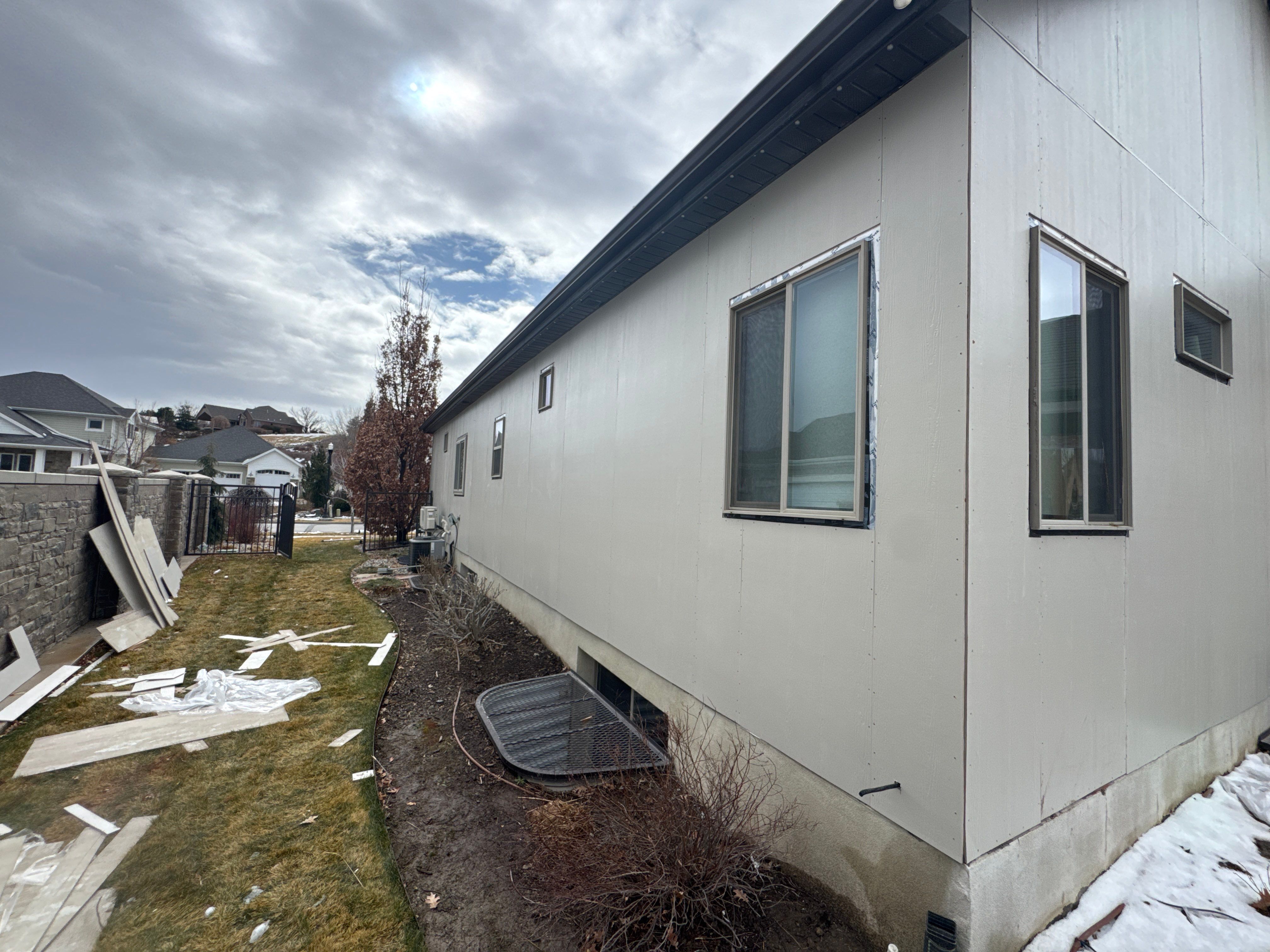 South Jordan | Massive Board & Batten Upgrade | Cobble Stone & Dark Bronze by Ideal Siding Utah