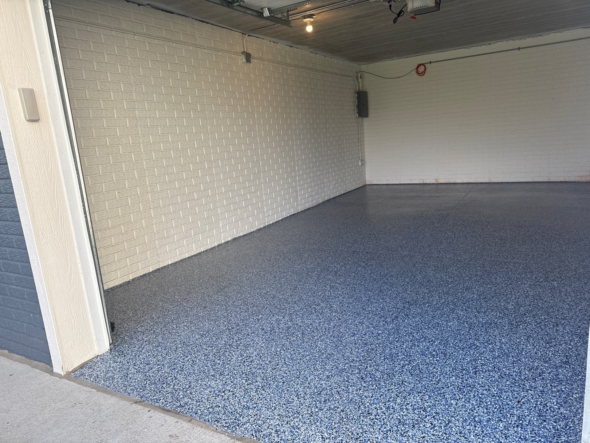 Grimes Garage Floor Coating by Revival Concrete Coatings