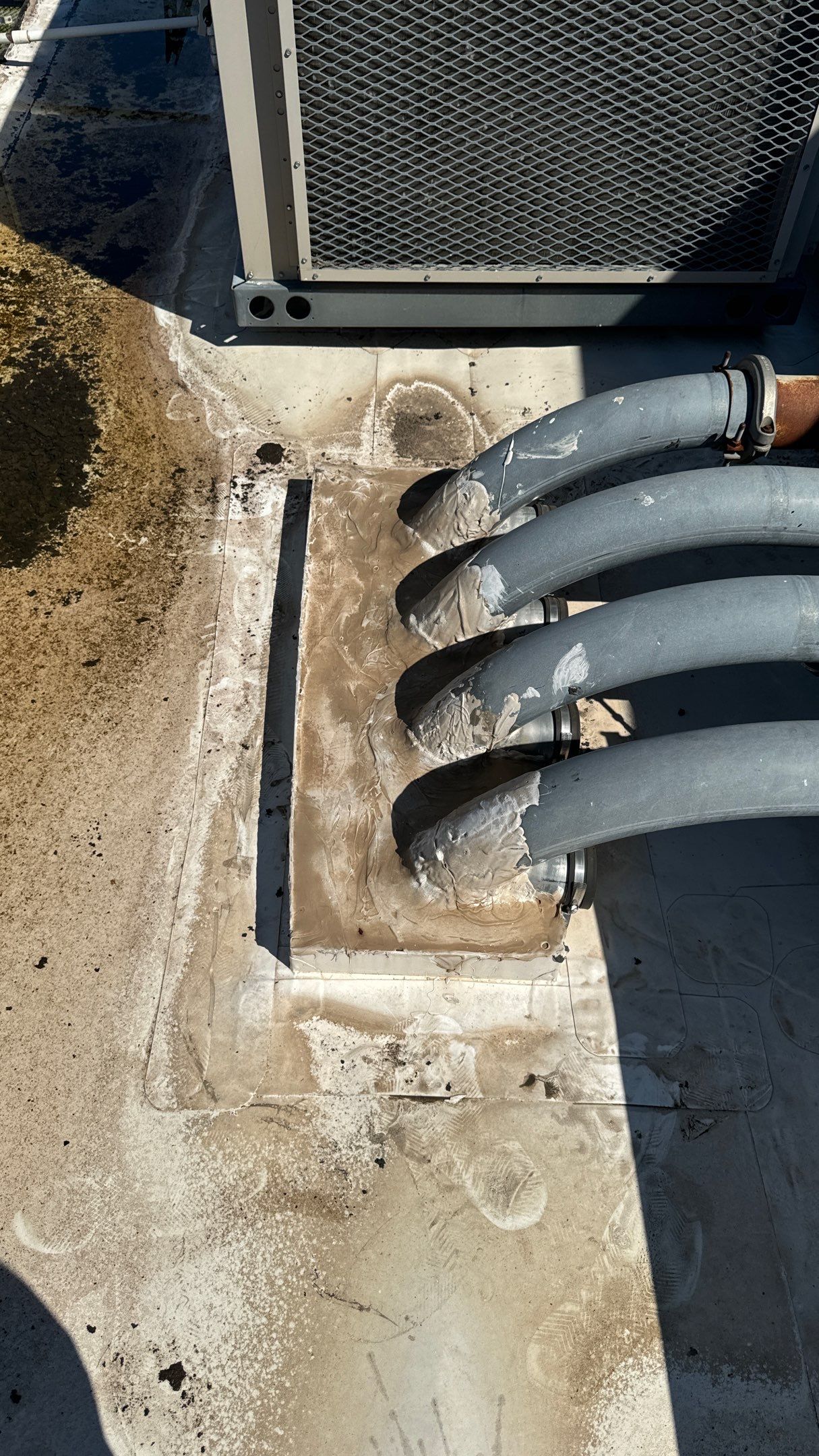 Commercial Roofing Repair using TRP #924 Eterna-Sil Premium Silicone Roof Coating by Harvey Roofing & Construction
