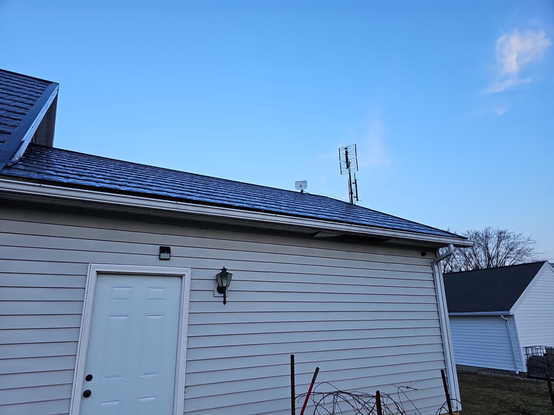 Residential Roofing Installation using Metstar Slate Plus Smooth Black by Nitro Roofing and Construction