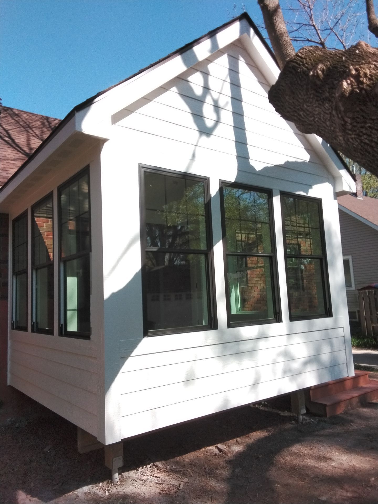 New 4 season room interior & exterior painting by Midwest Paint LLC