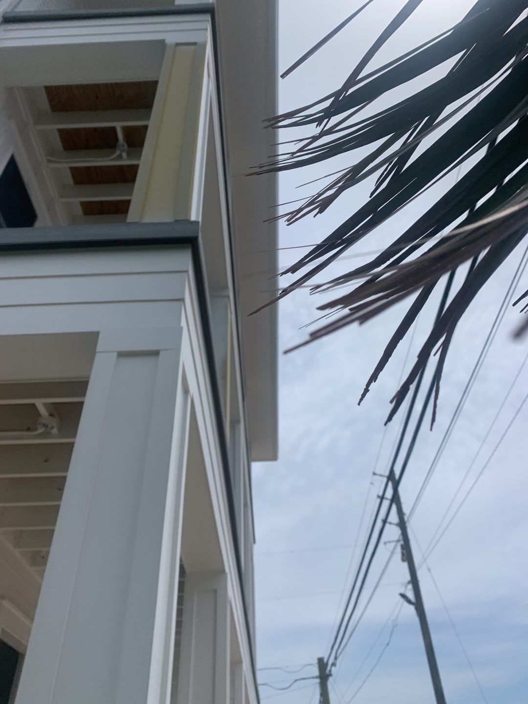 Downspout Installation for Multi-Story Building in Panama City FL by Gutter Professors