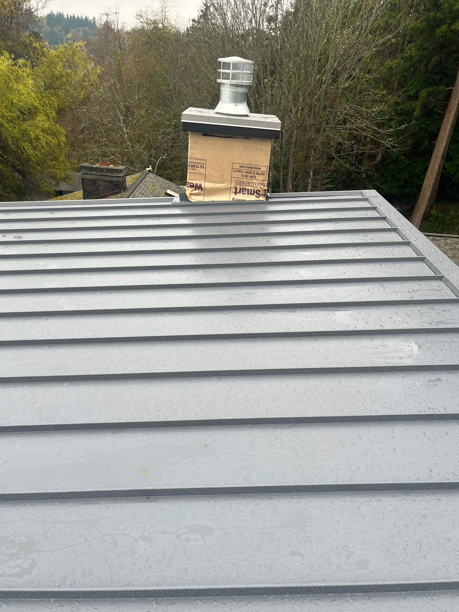 New Construction Roof Installation in Indianola, WA by Hanley Construction