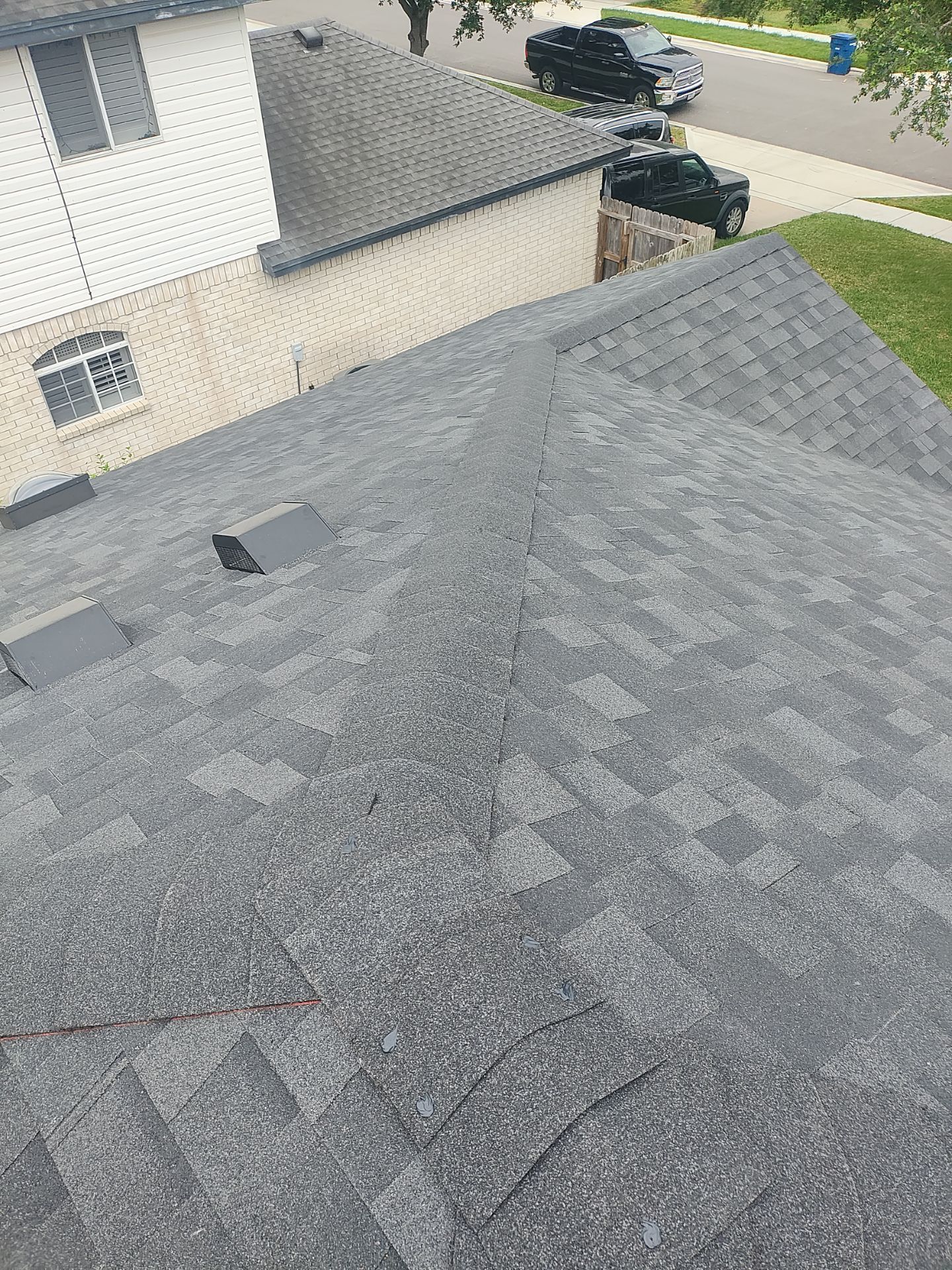 Nothing looks nicer than a little black roof by Bayfront Roofing and Construction