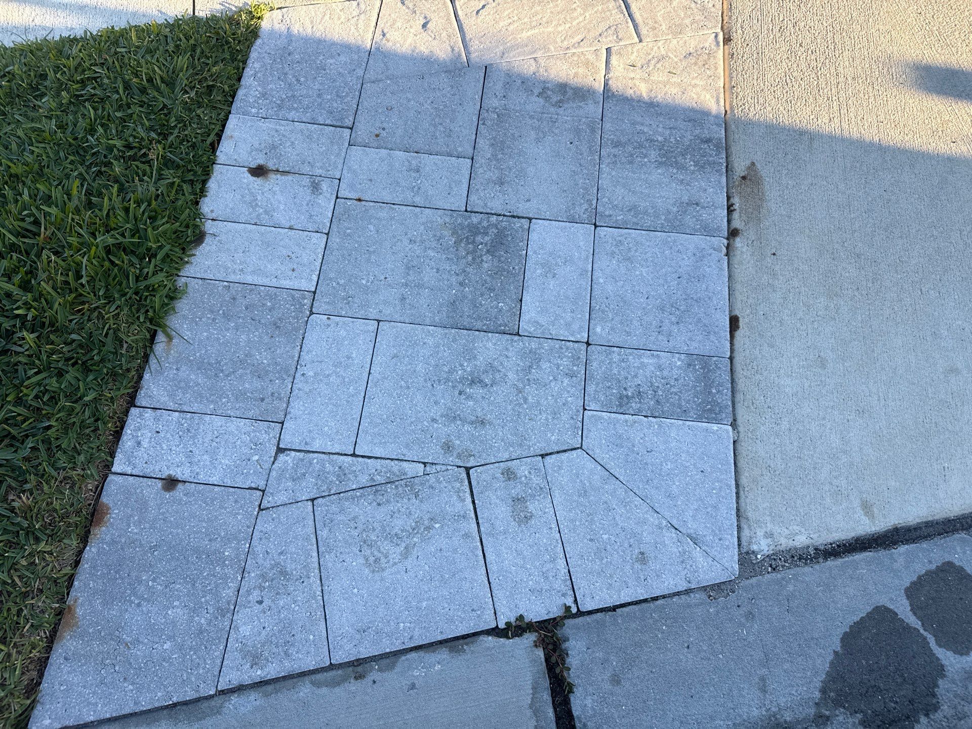 Rust Stain Removal from Concrete Driveway and Pavers in Park East at Azario | Lakewood Ranch, FL by Sunshine AquaWash