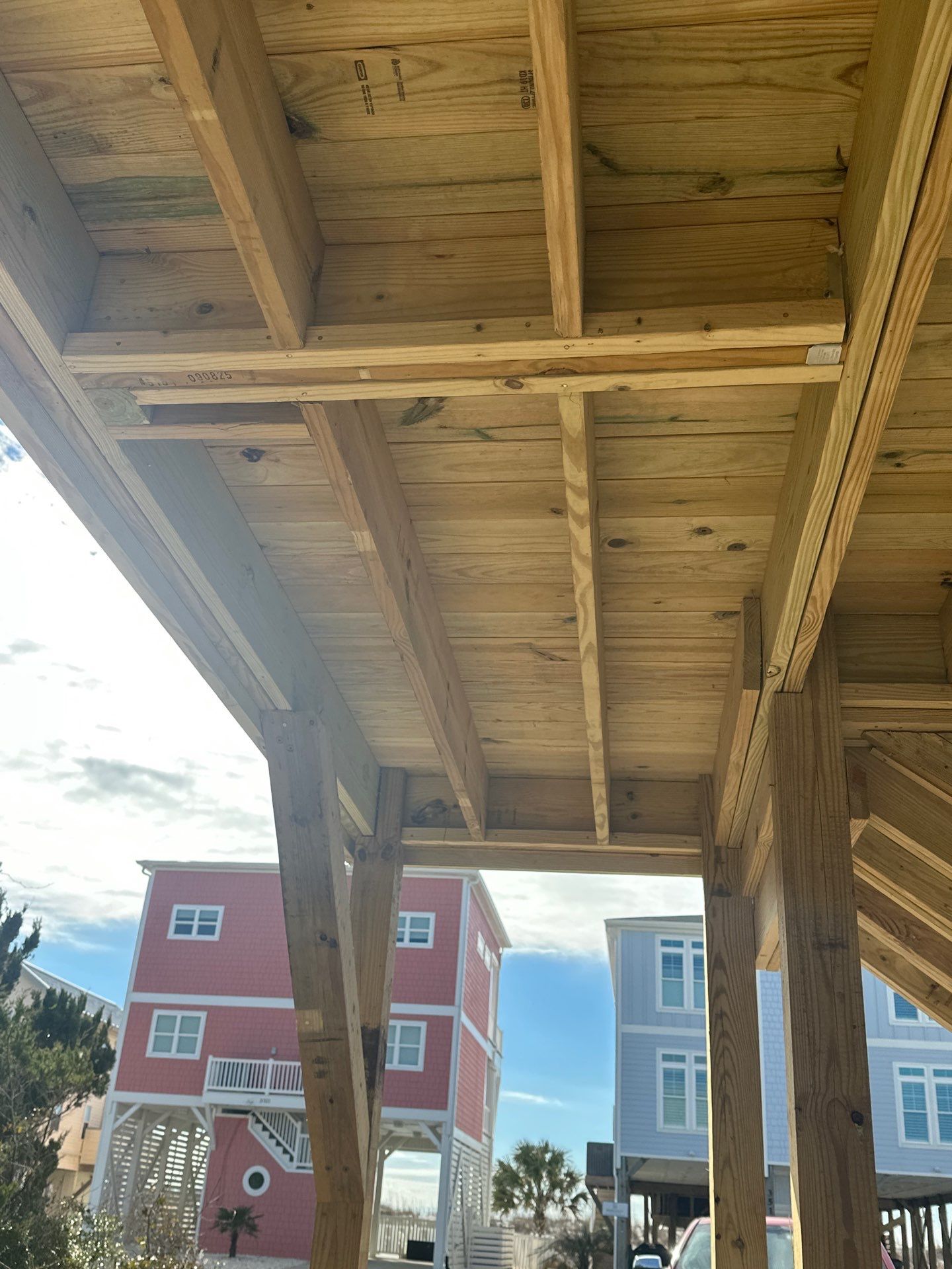 Deck Construction in Oak Island, NC | Coastal Outdoor Living Project by RGR Construction and Roofing, LLC
