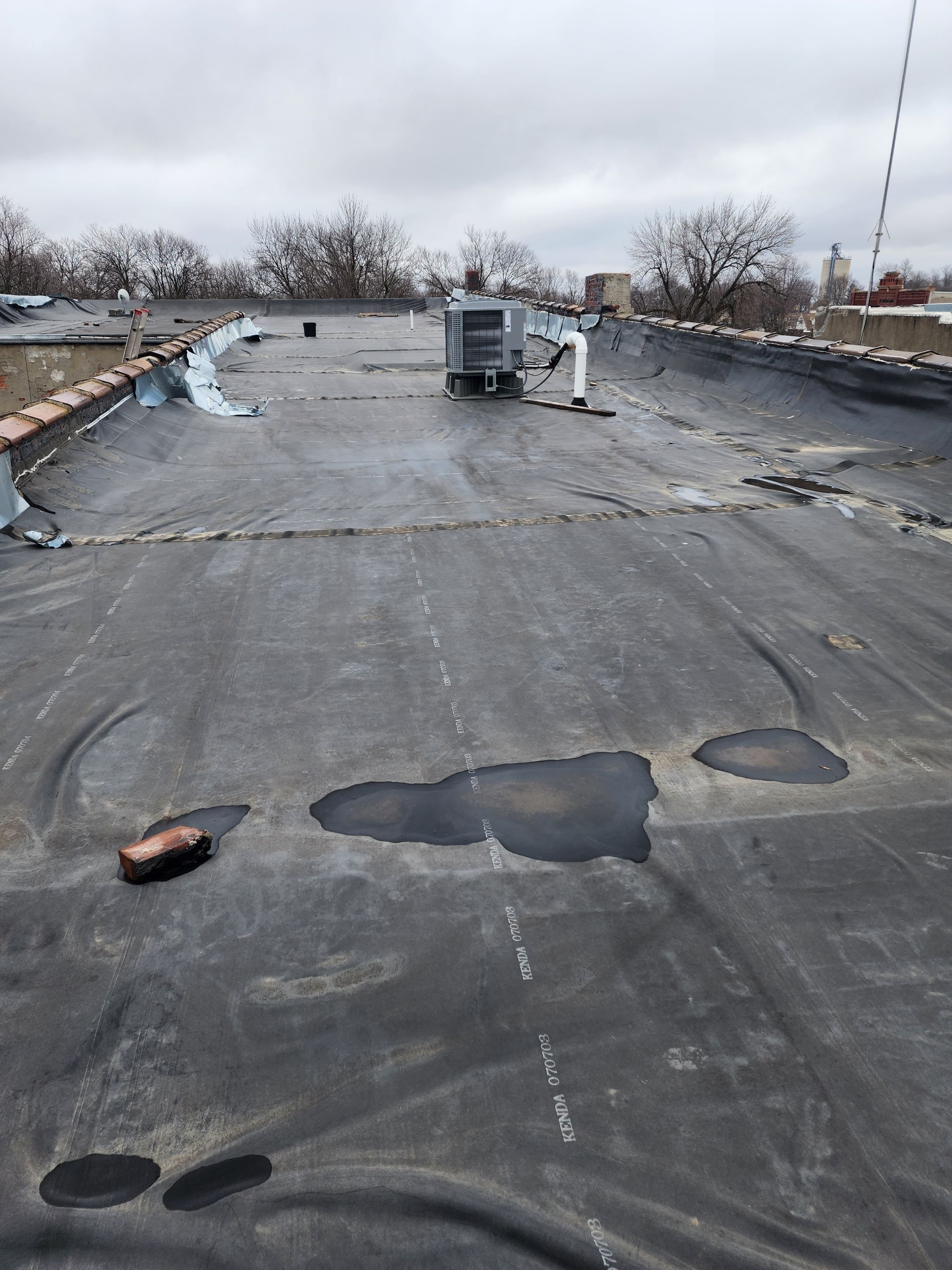 Roof Recover on a downtown building in Lake City  by Grell Roofing, LLC