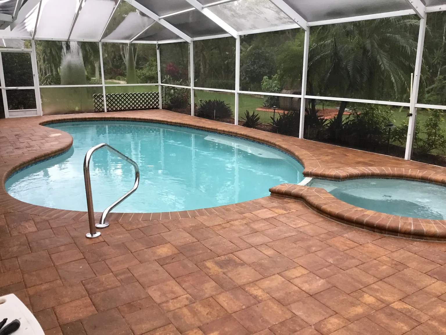 Paver Sealing and Striping for Sun City Center Pool Deck by Supreme Paver Experts