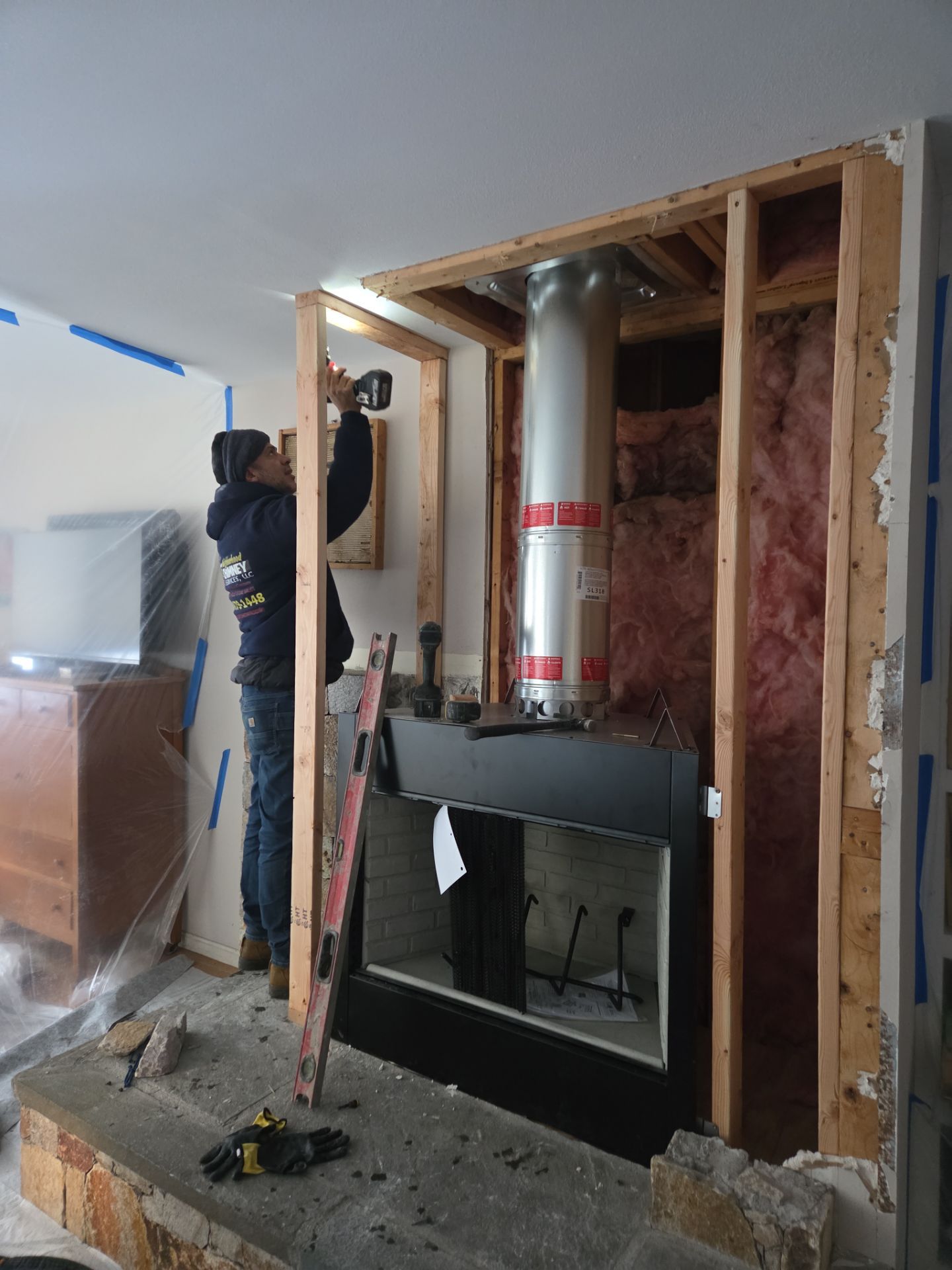 Wood Fireplace Replaced by Neighborhood Chimney Services 