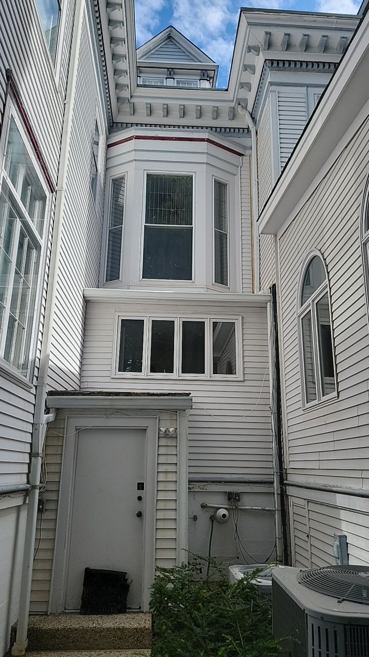 Housewashing  using Algaecide, soft wash soap by Northern Power Washing LLC.