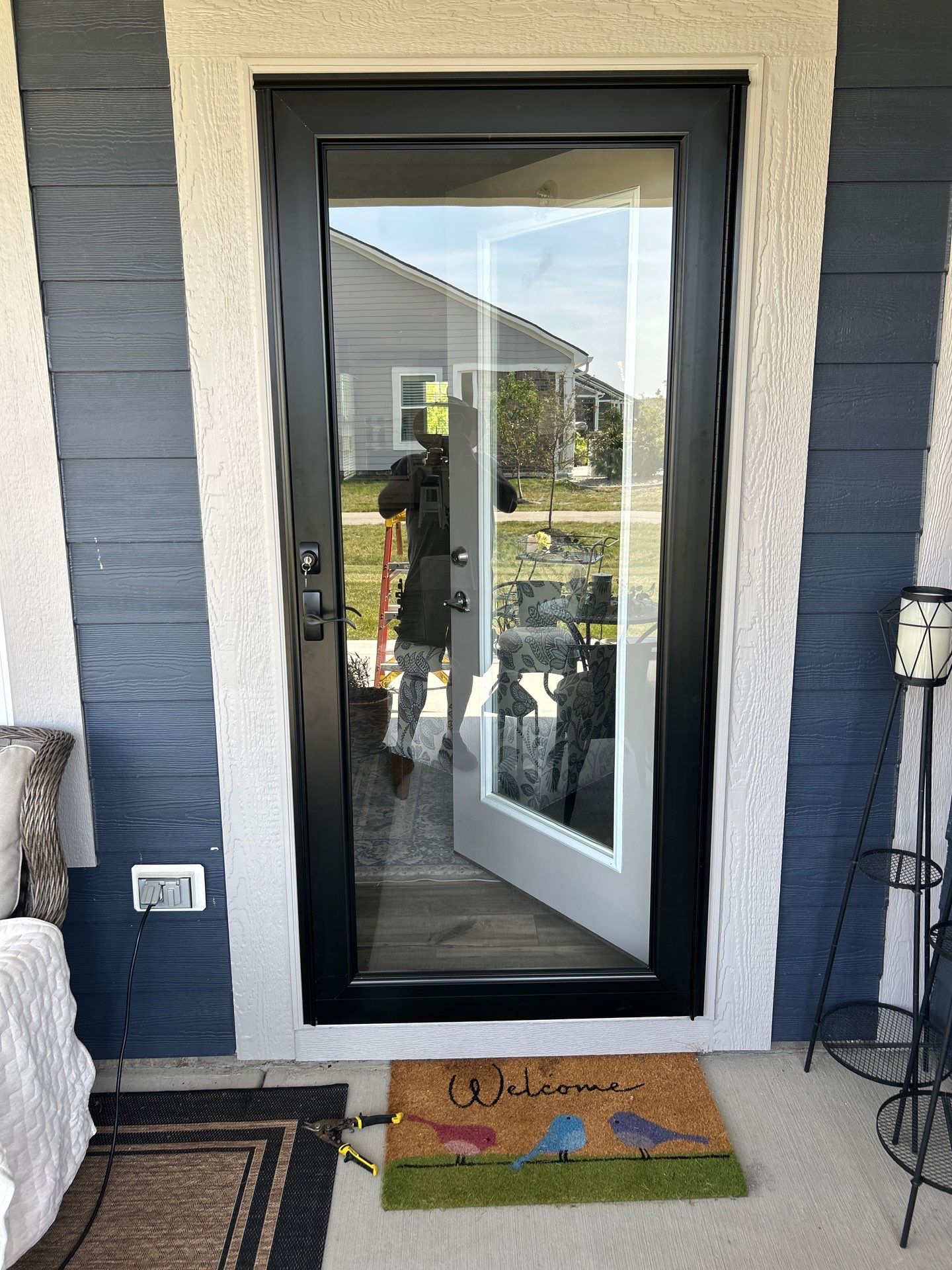Black Storm Door Installation with Hardware Upgrade in Westfield by Merrifield Exteriors, LLC