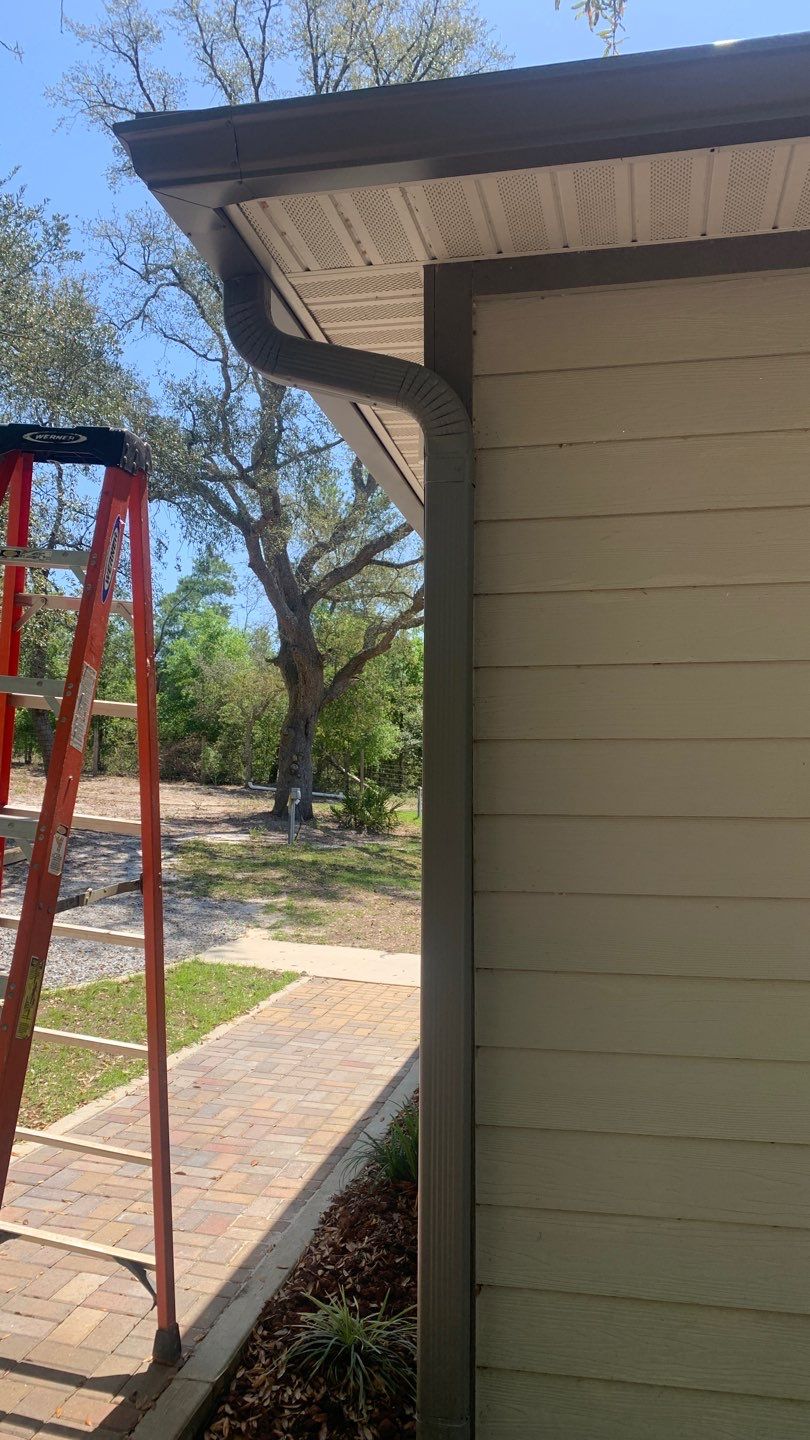 Gutter Installation Using Charcoal Grey K-Style Seamless Aluminum Gutters by Gutter Professors
