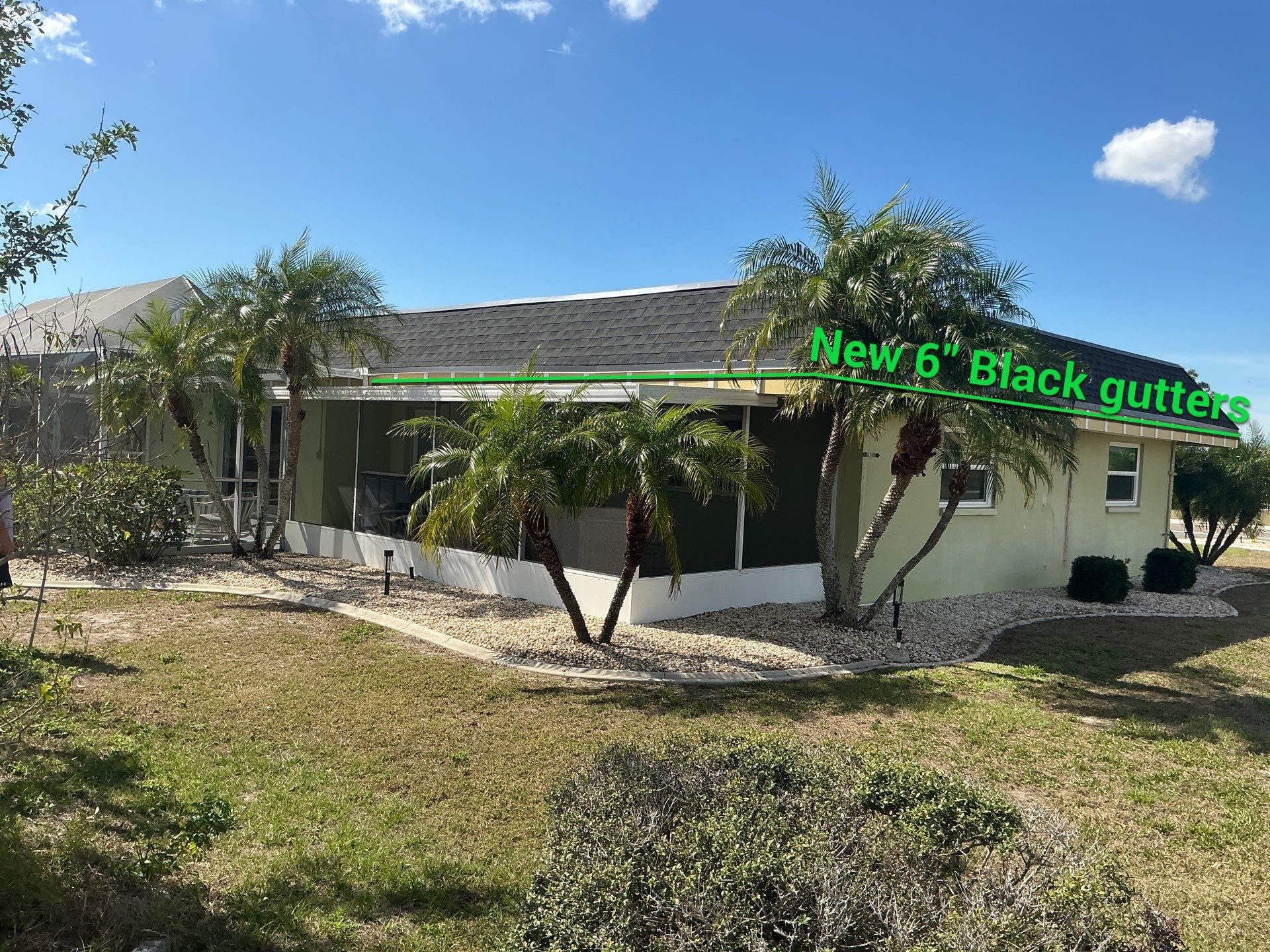 Black 6'' Seamless Gutters K-Style and Black Downspouts in Sun City Center FL by Gutter Professors