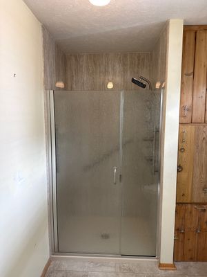 Modern Jacuzzi Walk-In Shower Remodel with Glass Doors in Cedar