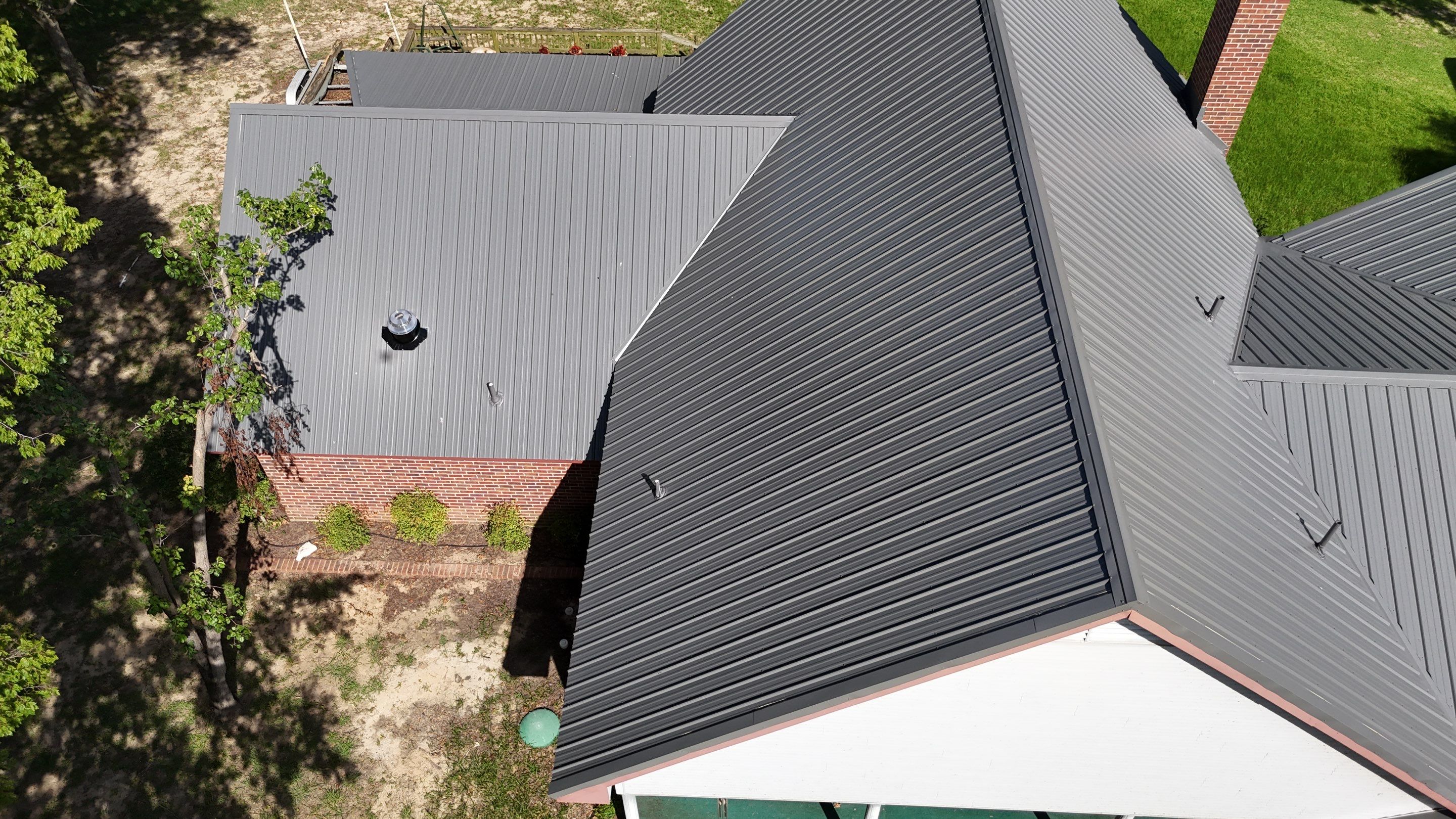 Charcoal Metal Roof at Lake Limestone, Tx by DT Roofing - Seth Wells