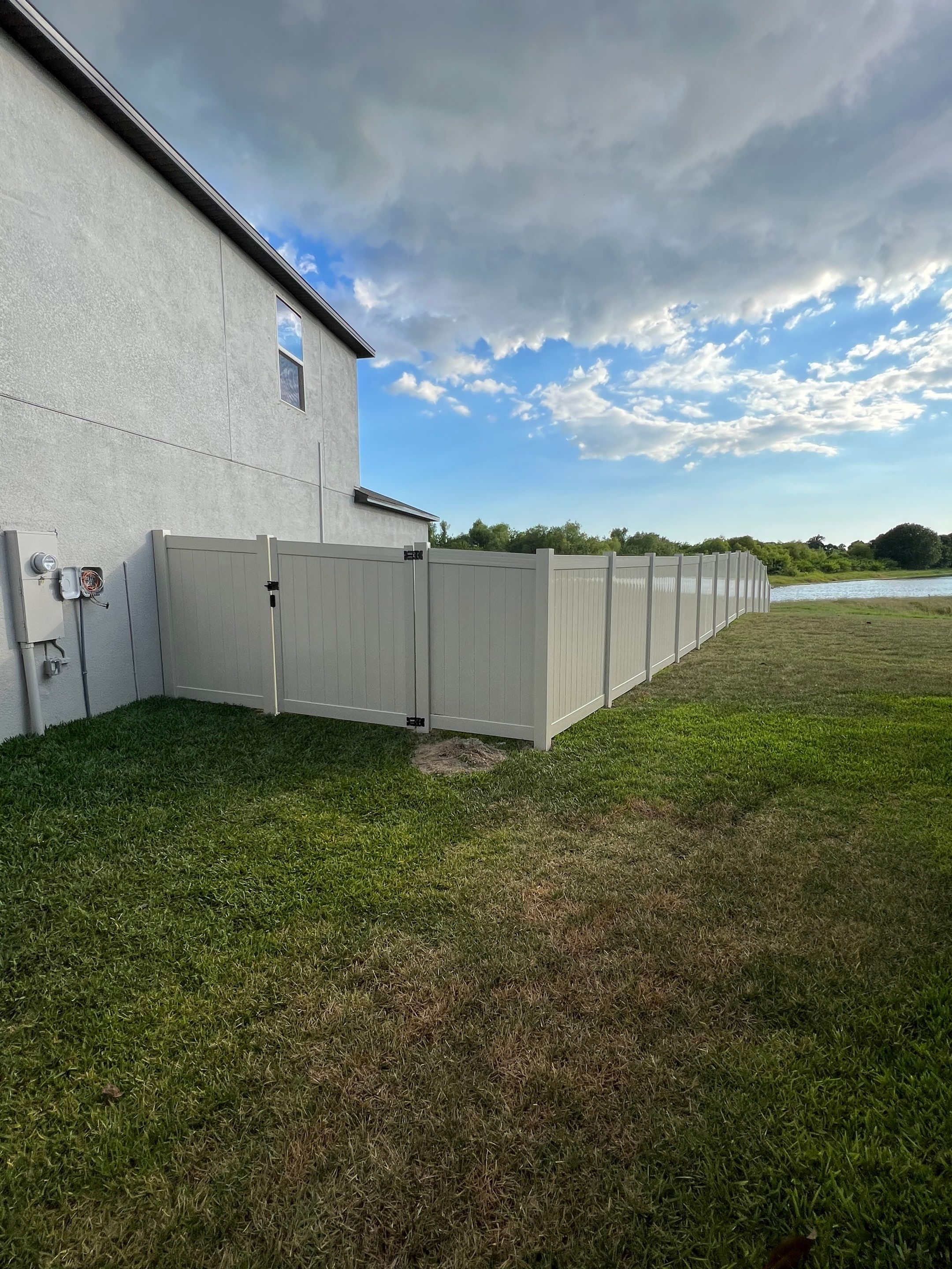 Apollo Beach, FL 6ft. Tall Tan Vinyl Privacy Fence by Asap fence and gates, LLC