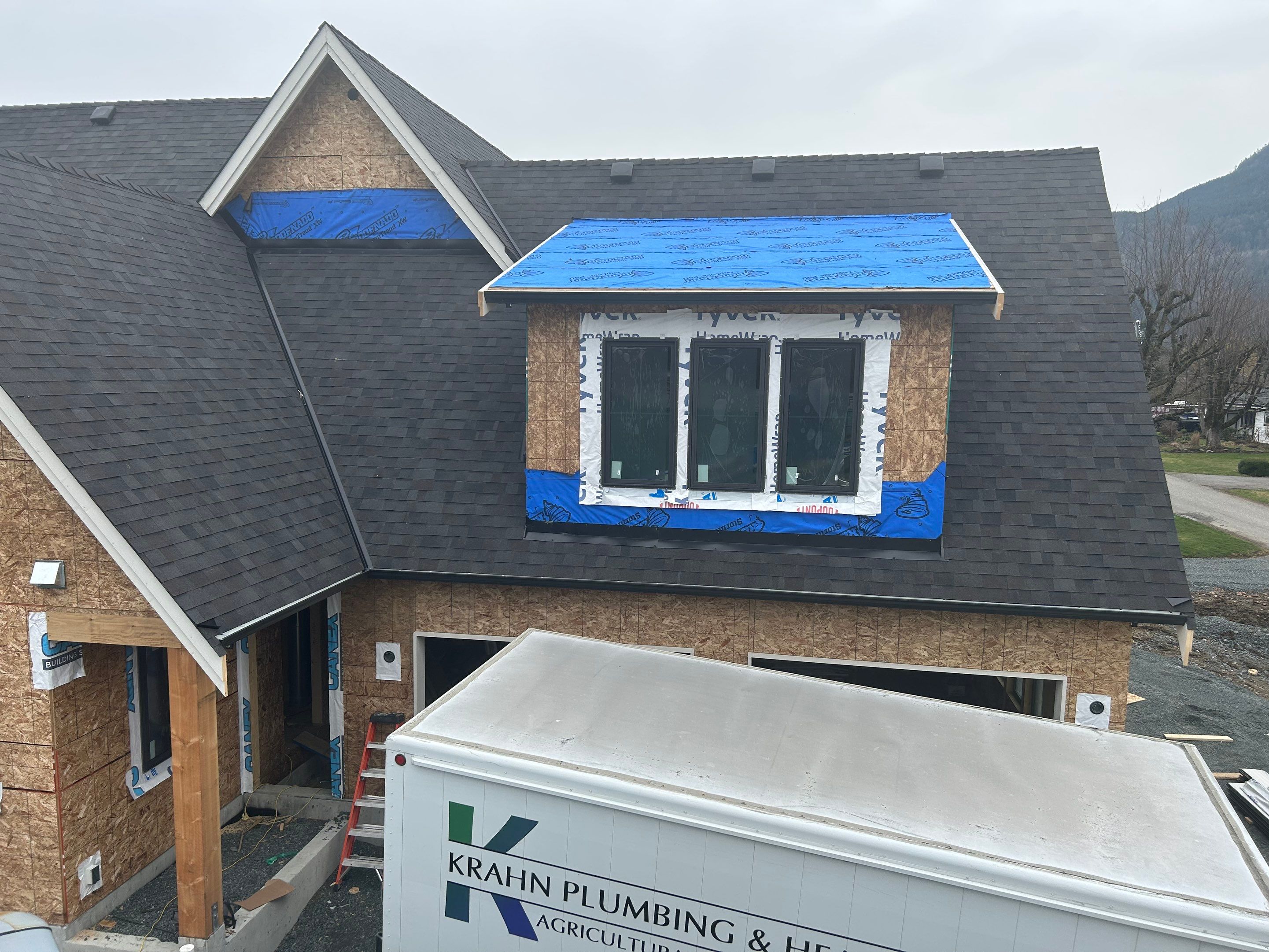 Residential Roofing Installation using Malarky Vista Shingles and Prolok Metal  by Top Notch Roofing Inc