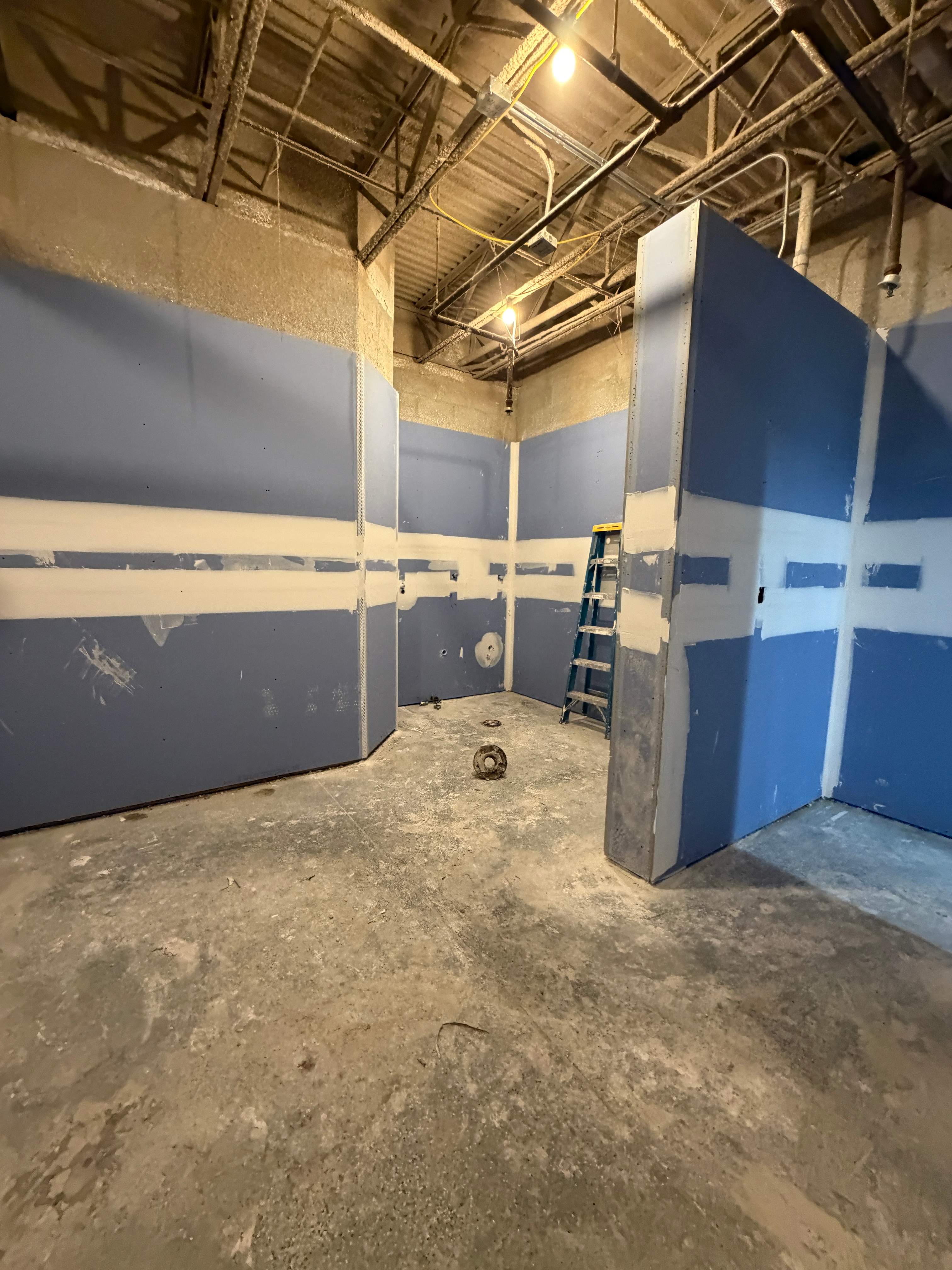 Commercial Restroom Renovation with Epoxy Flooring in Sarasota by Vertical General Contracting 