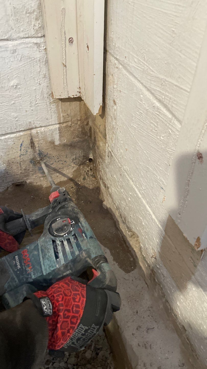 Interior Drain Tile & Buried Discharge in St. Anthony, MN by Waterproofing Northeast