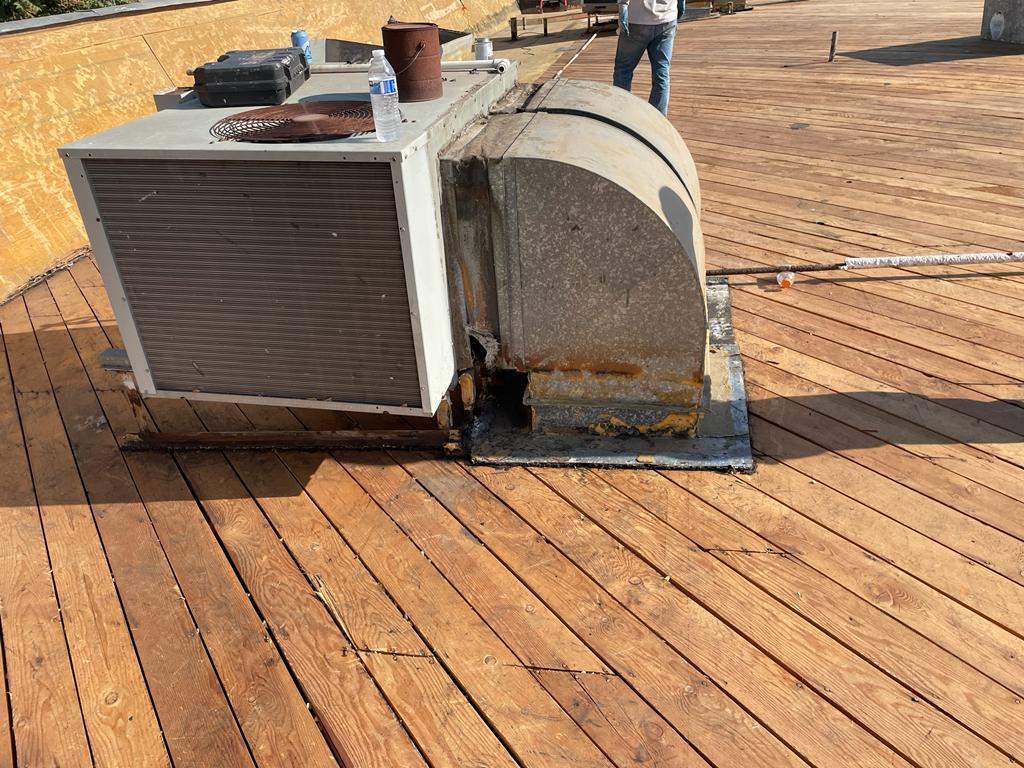 Commercial Roofing Installation using General Coatings acrylic coatings and spray foam by Straight Edge Roofing Inc