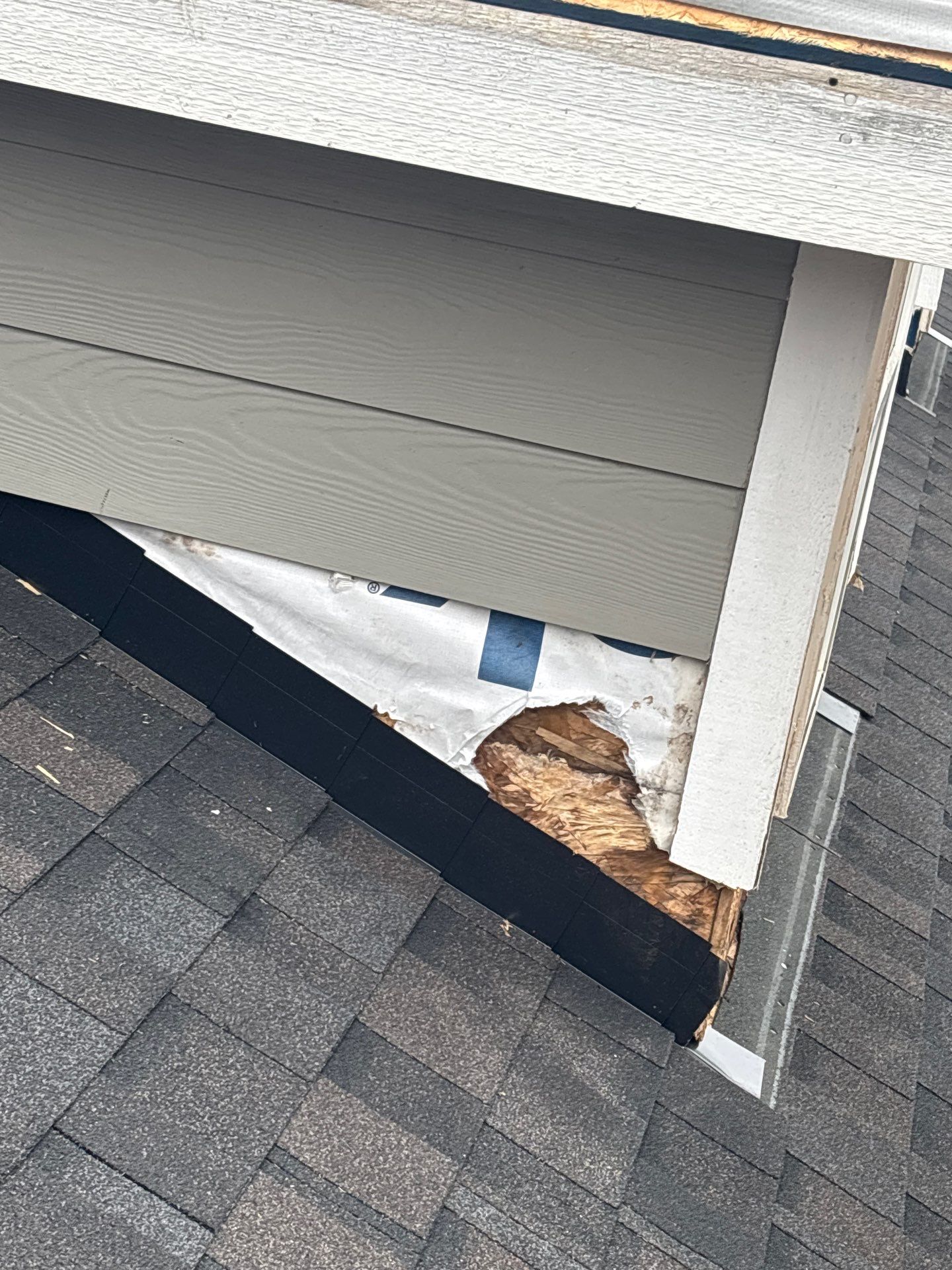 Residential Roof Replacement with Metal Accents by Orezona Building & Roofing Company, Inc.