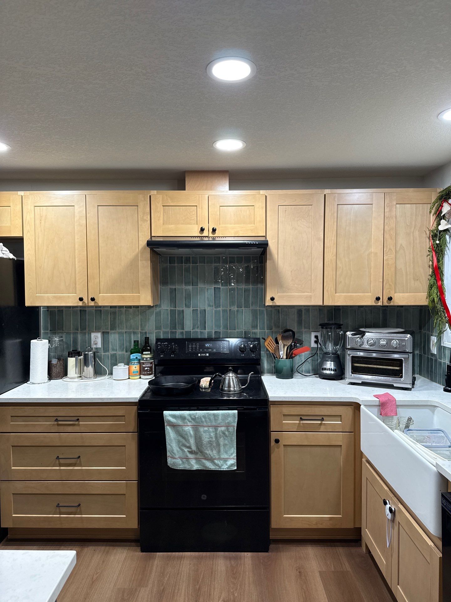 Vancouver Kitchen Renovation Featuring Tile Backsplash and Farmhouse Sink by American Made Construction 