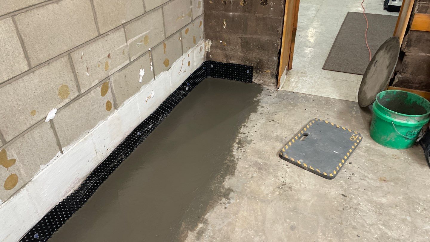 Interior Drain Tile & Sump System in St. Paul, MN by Waterproofing Northeast
