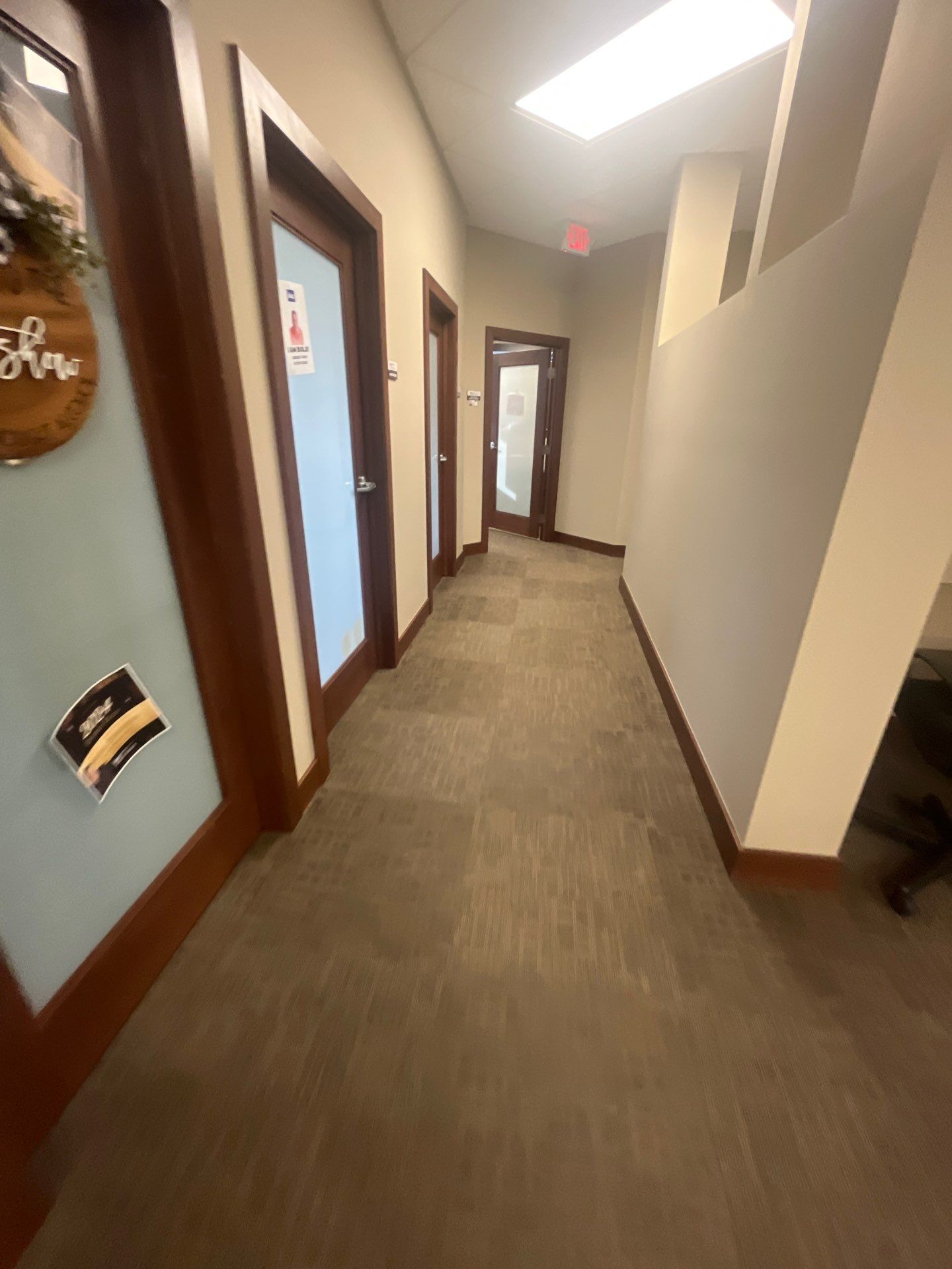 Commercial Office Interior Remodel and Modern Suite Refresh in Sioux Falls by Select Painting, Coatings & Garage Cabinets