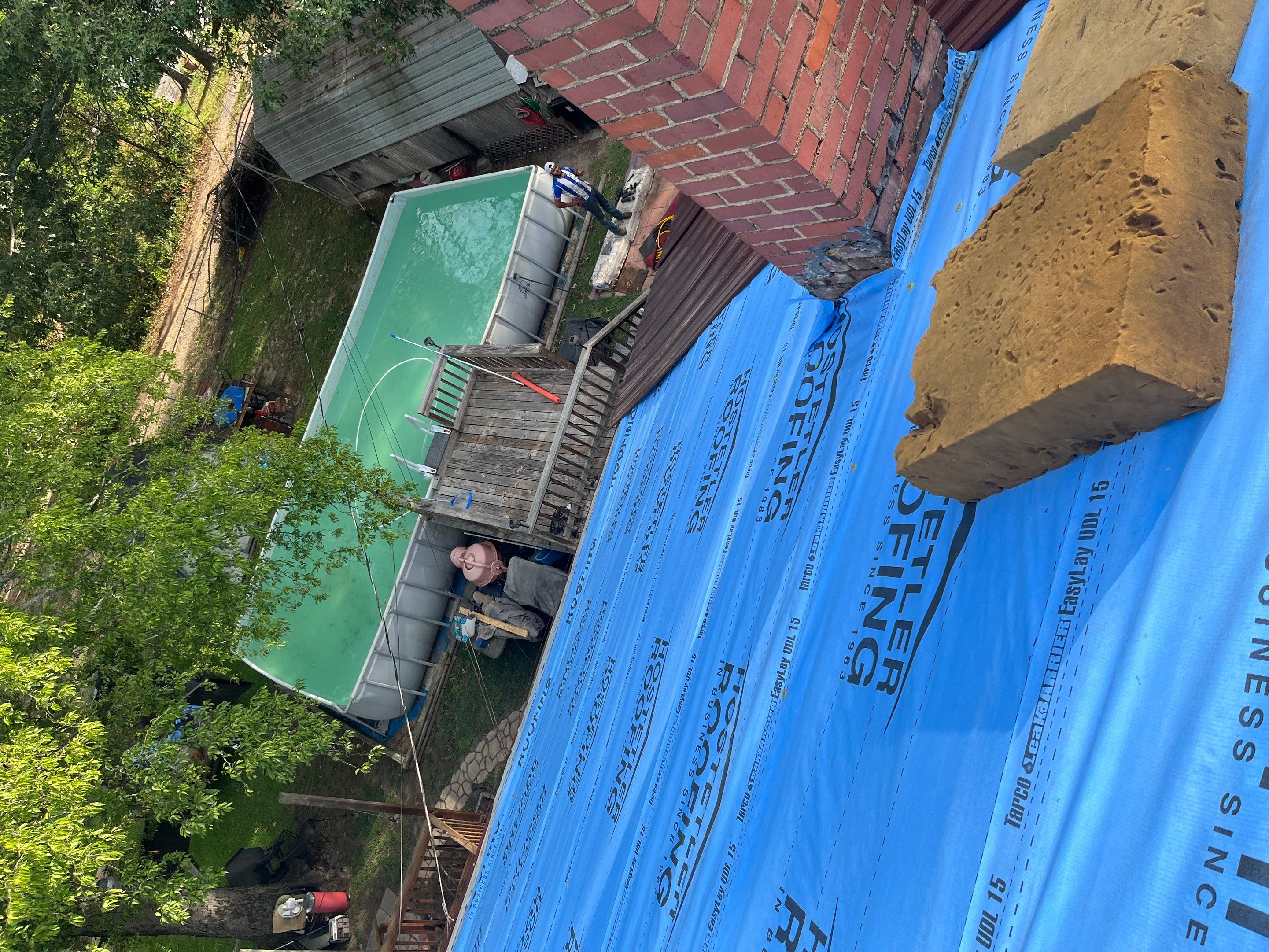 Residential Metal Roof Replacement using Reed's Metals: Colored Residental Panel (Burgundy) by Hostetler Roofing