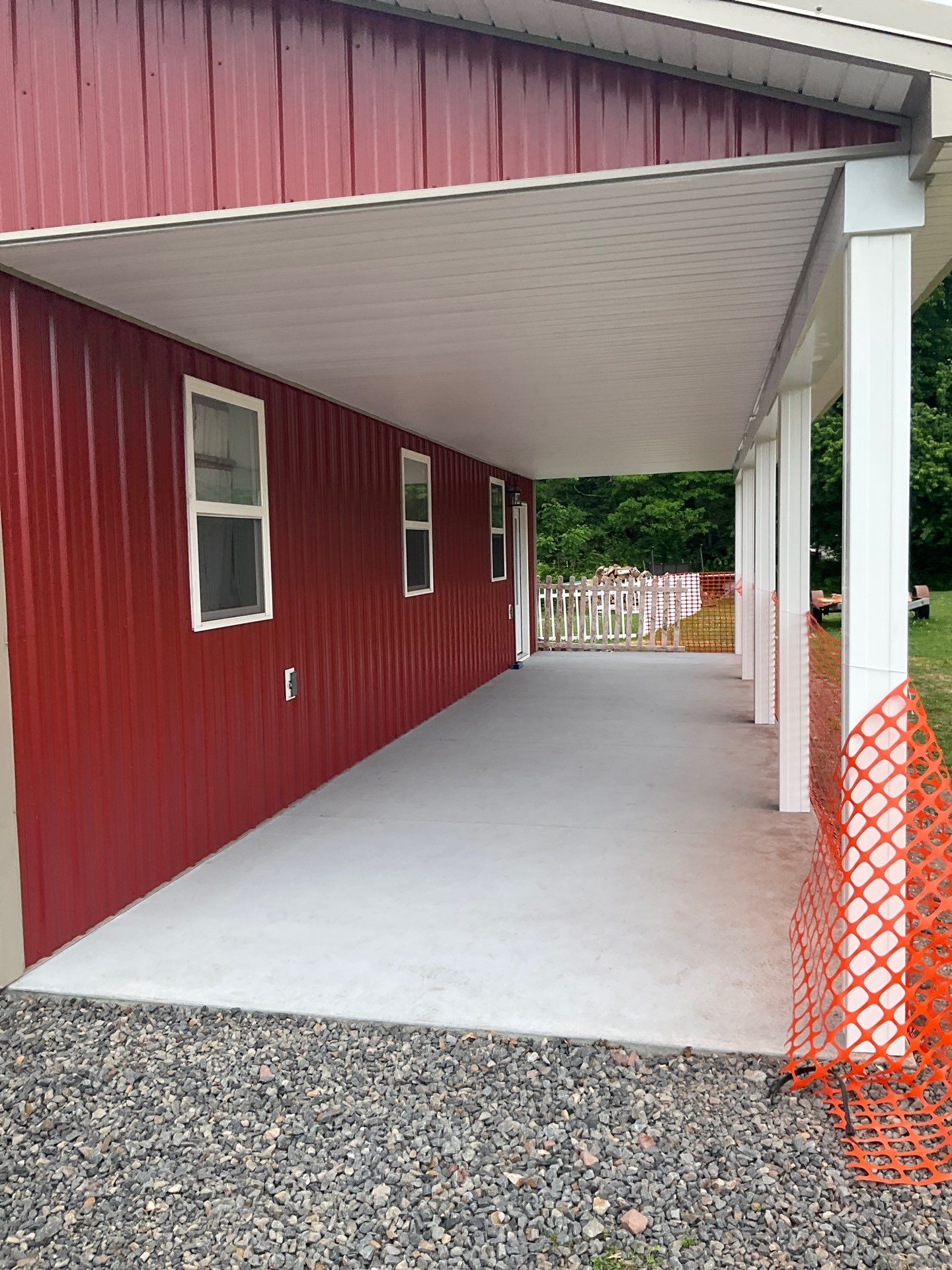 Covered Concrete Porch Addition and Exterior Door Installation in Tower City by Esh Builders