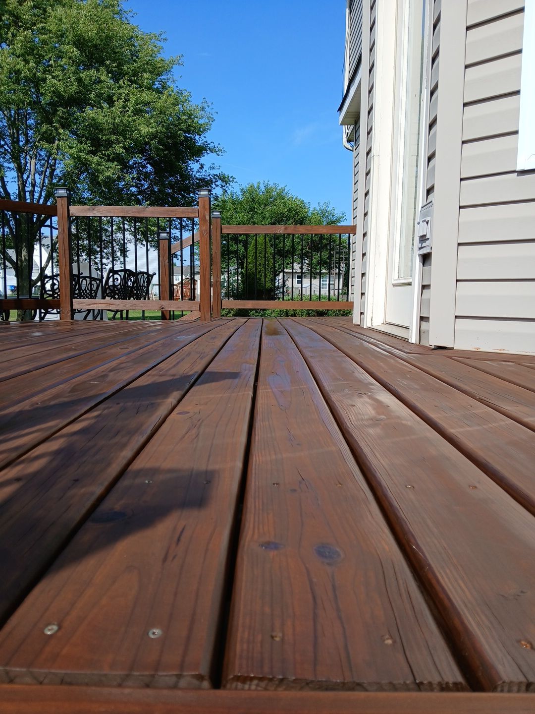 Tucker Deck Staining  by Two Brothers Residential Maintenance