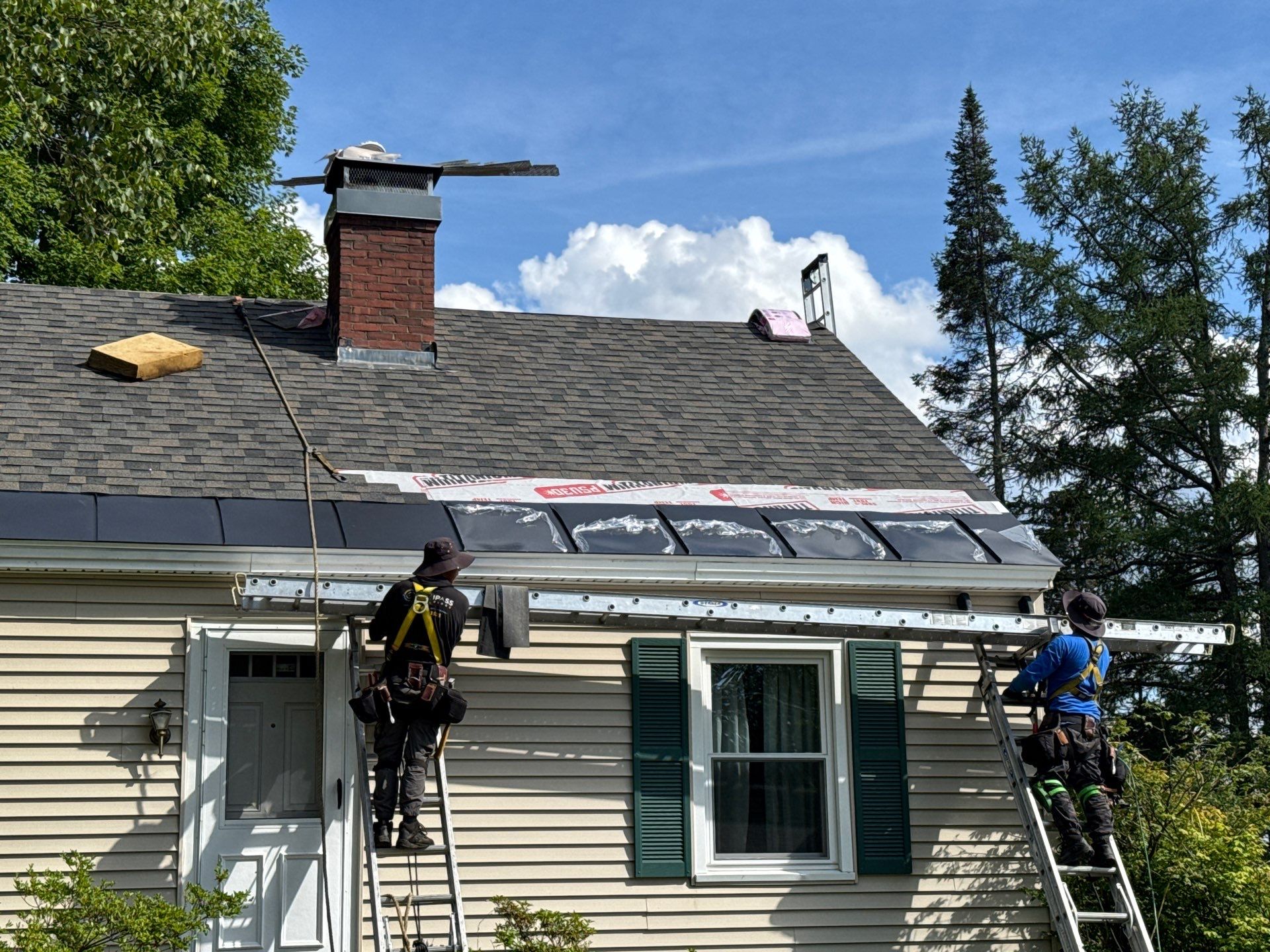 Hybrid Roof Replacement in Pembroke, NH with Owens Corning Peppercorn Shingles, EPDM Rubber Roofing, and Black Metal Ice Belt by Compass exteriors