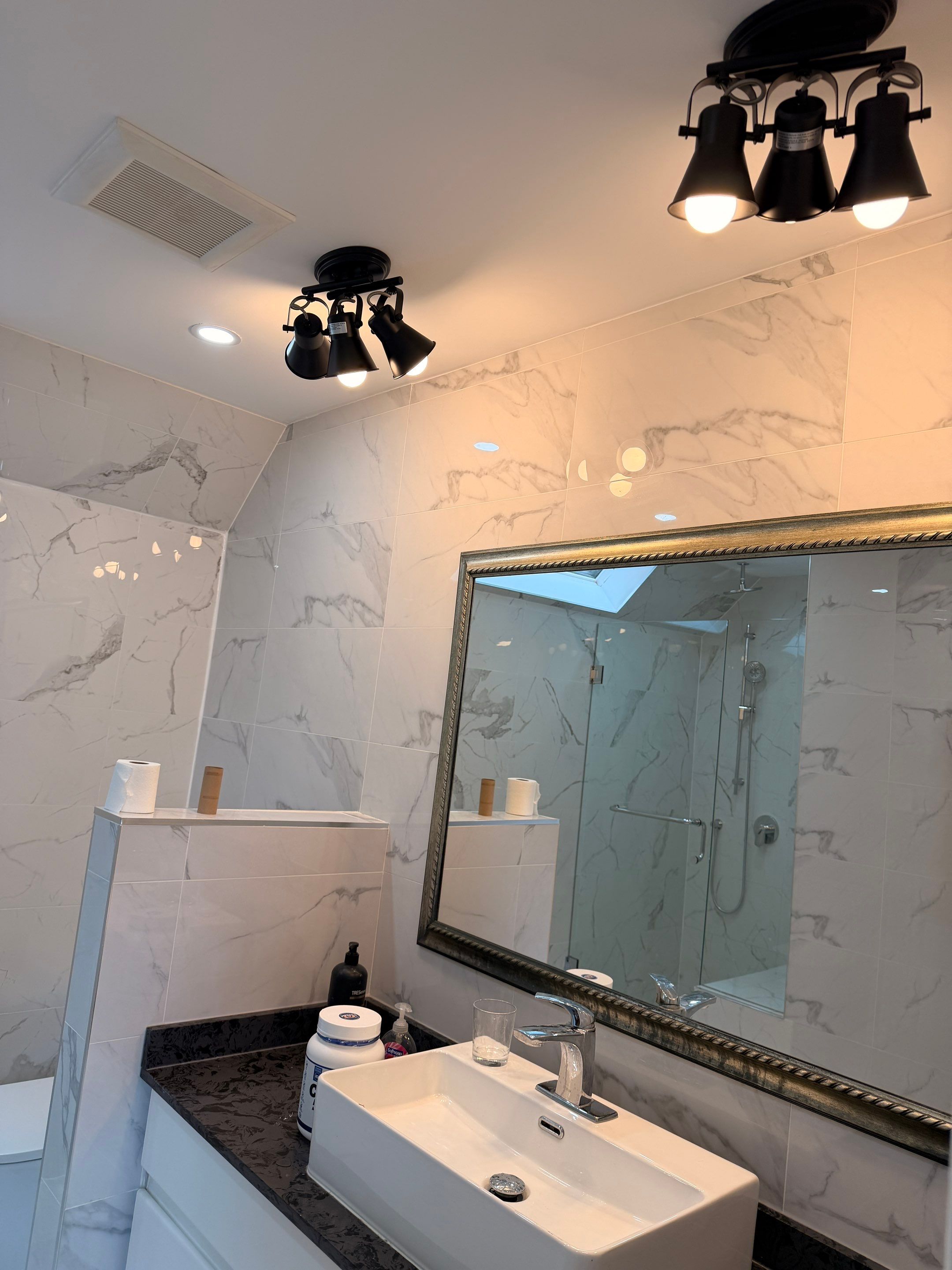 Water Damage Restoration & Bathroom Renovation in West Vancouver by YVR Construction Group