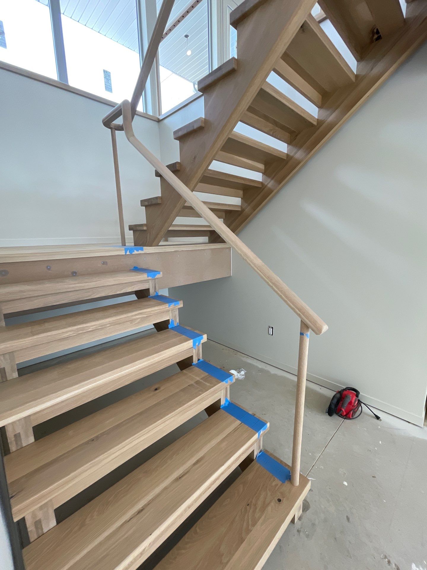 Hand Carved Staircase steals the show by RTBaldwin Hardwood Floors
