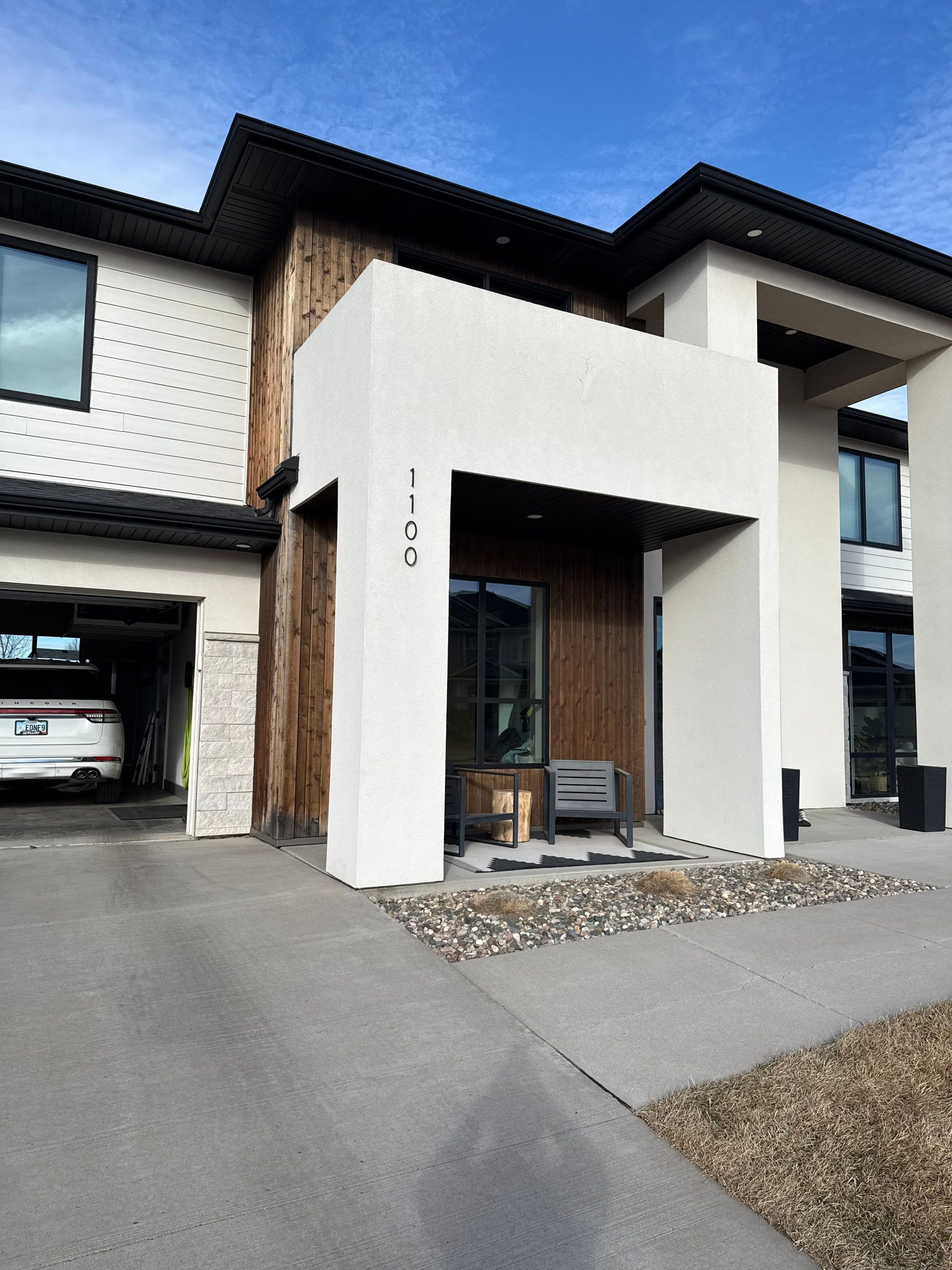 Modern Residential Exterior Painting and Door Refinishing in Sioux Falls by Select Painting, Coatings & Garage Cabinets